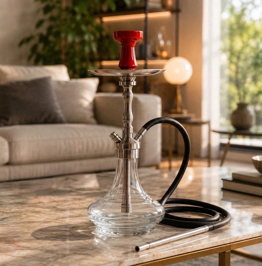 Freshly cleaned and reassembled shisha displayed on a marble table in a bright living room.