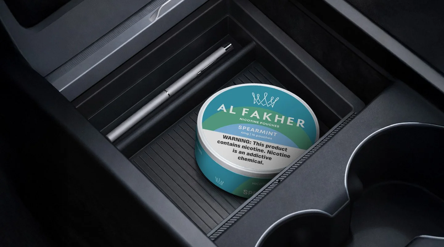 Al Fakher Spearmint Nicotine Pouches can placed inside a car storage compartment.