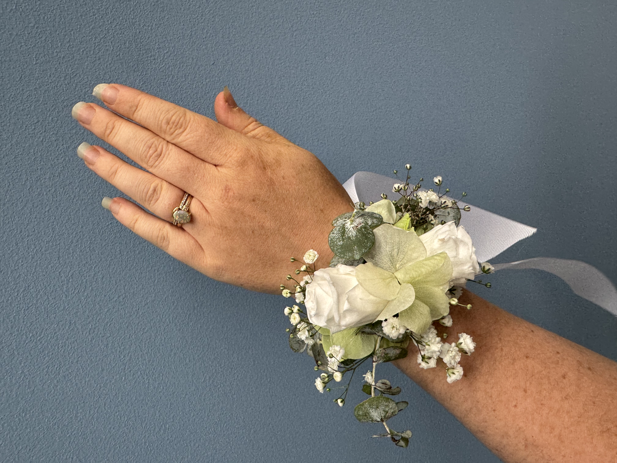 image of flowers placed on wrist
