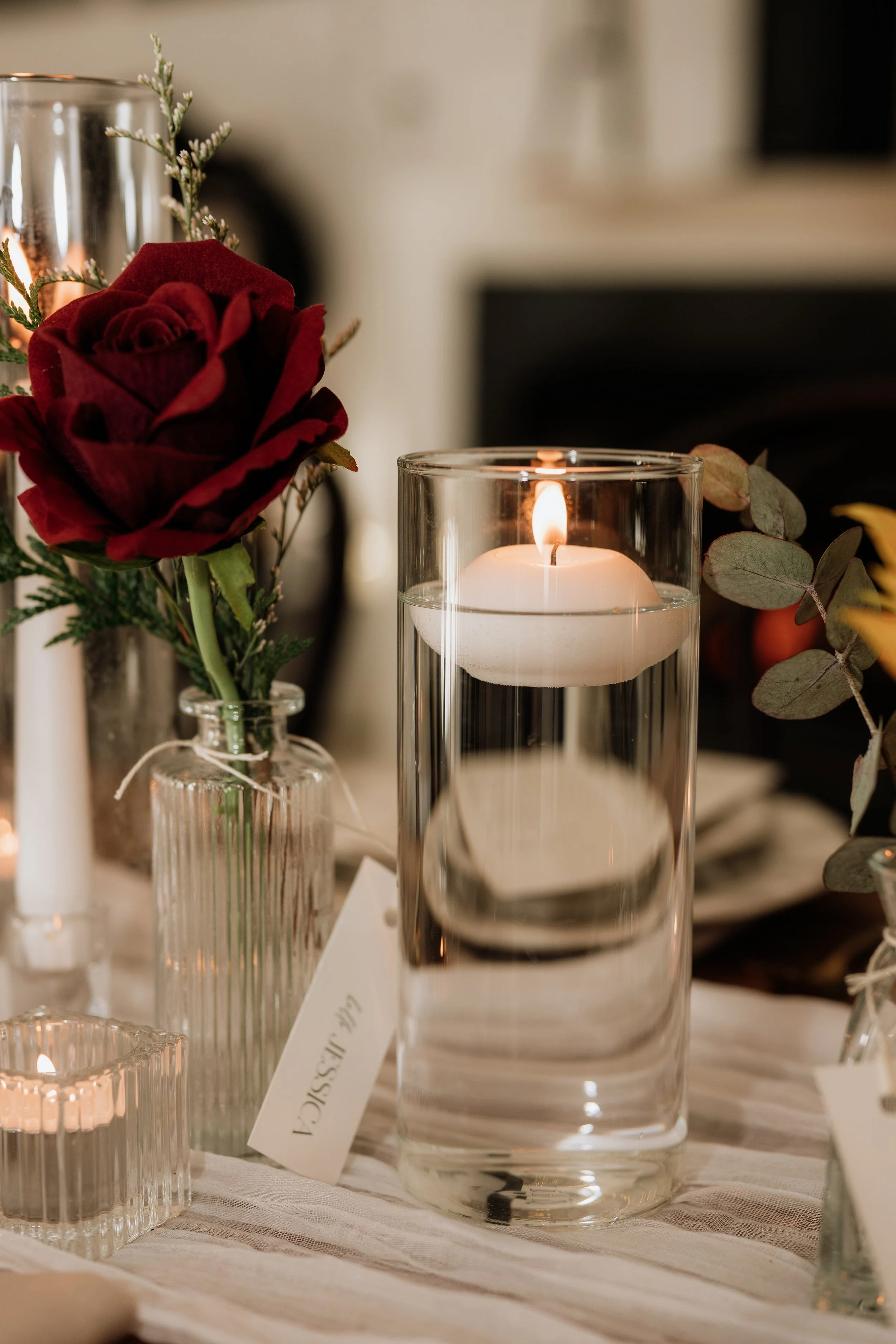image of flowers in bud vase holders