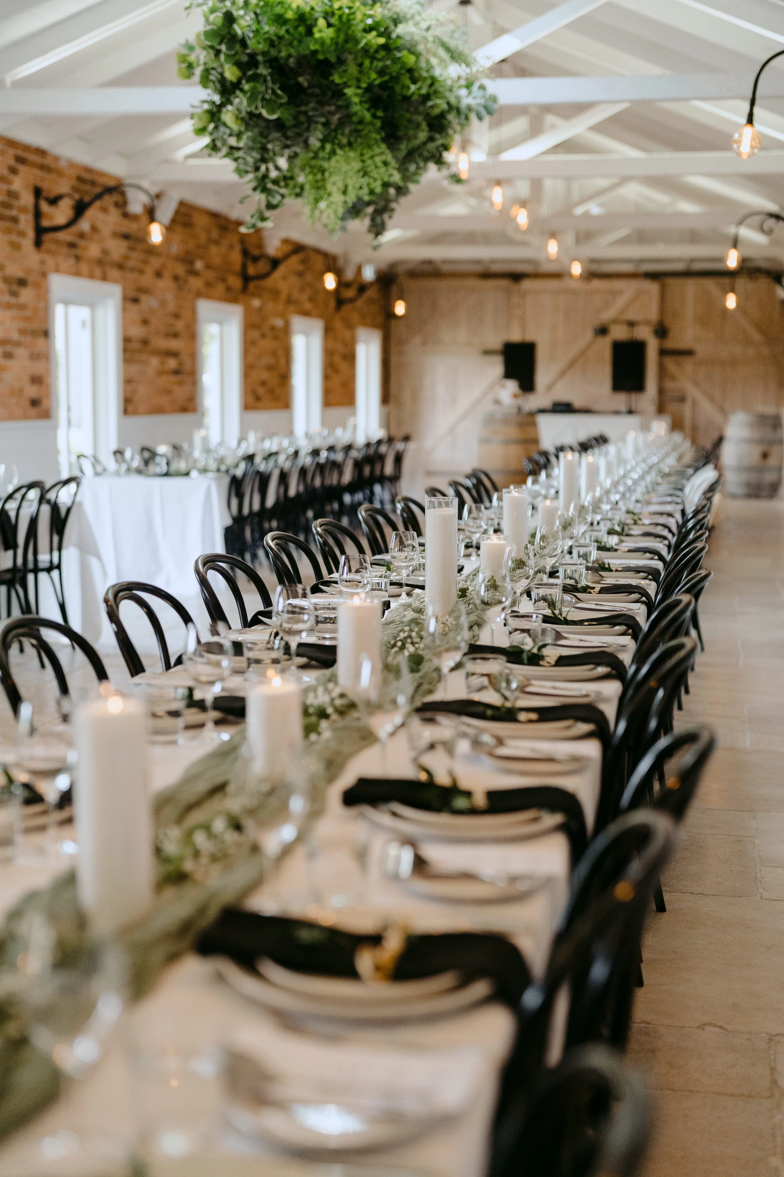 pillar candles guest tables at wedding melbourne