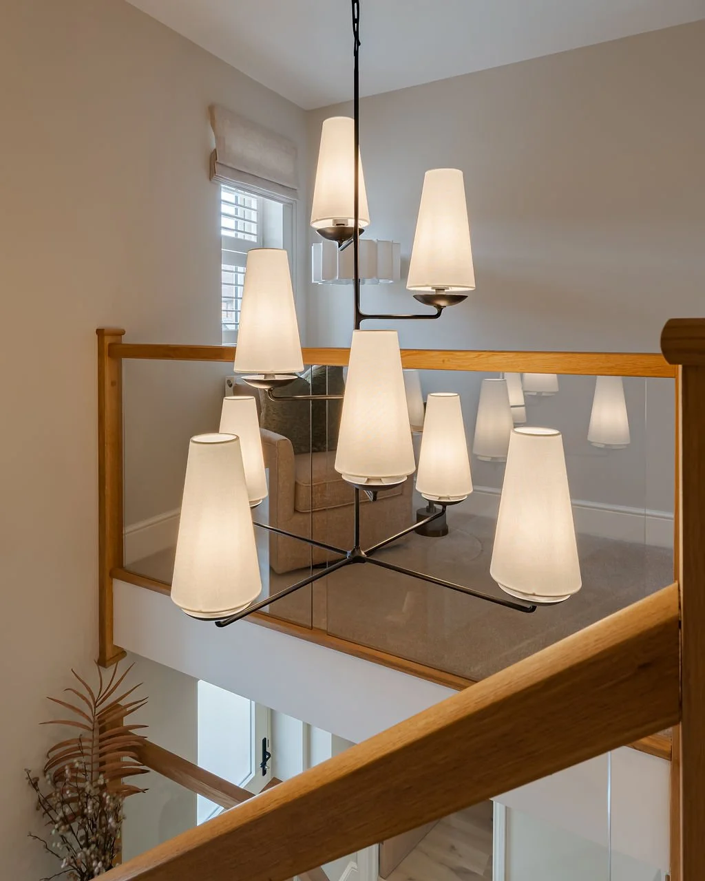 Entrance space blending contemporary design with rustic farmhouse details in Lime house home