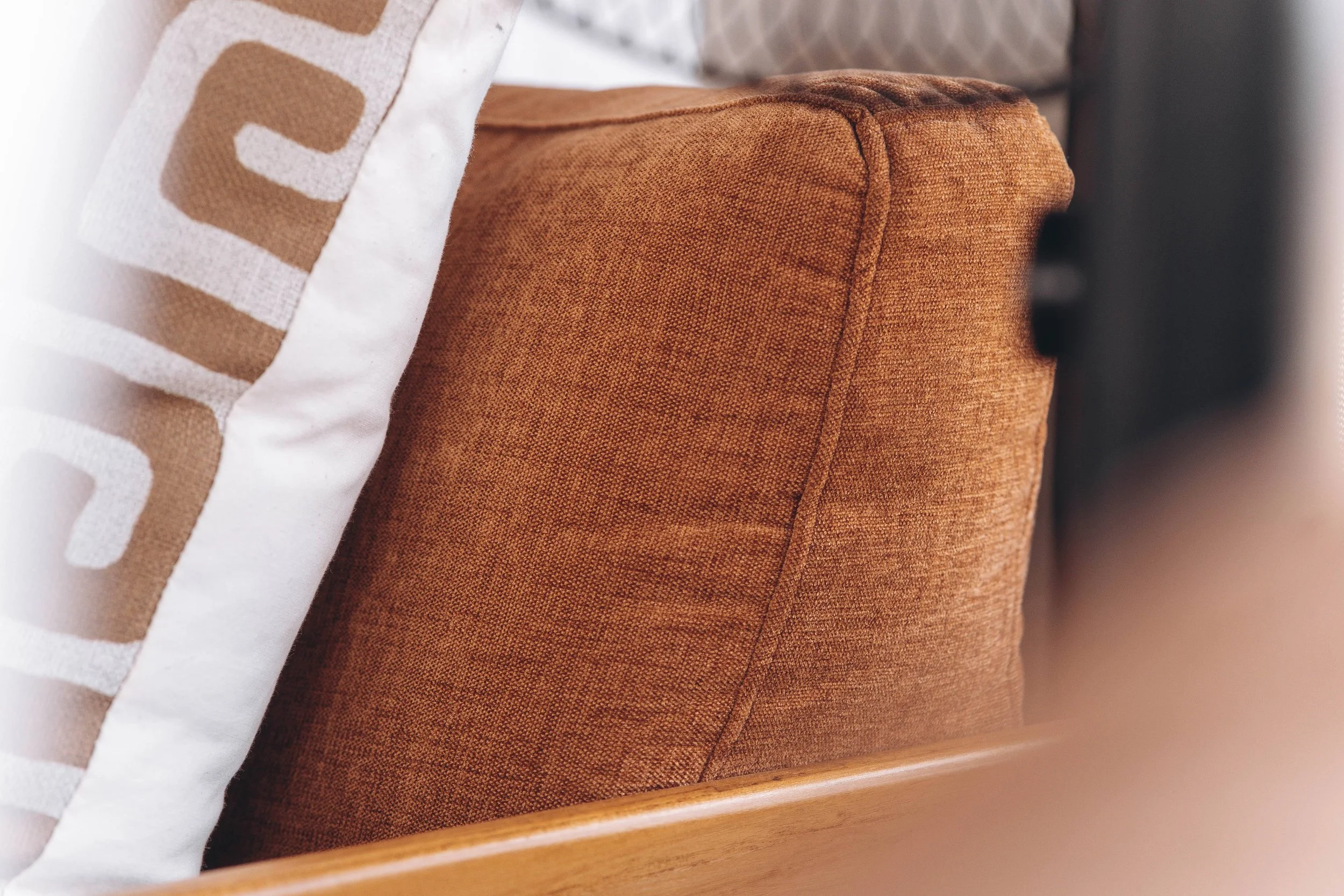 Luxury bush dining setup in the African savannah at sunset, surrounded by trees and wilderness for an exclusive safari experience.