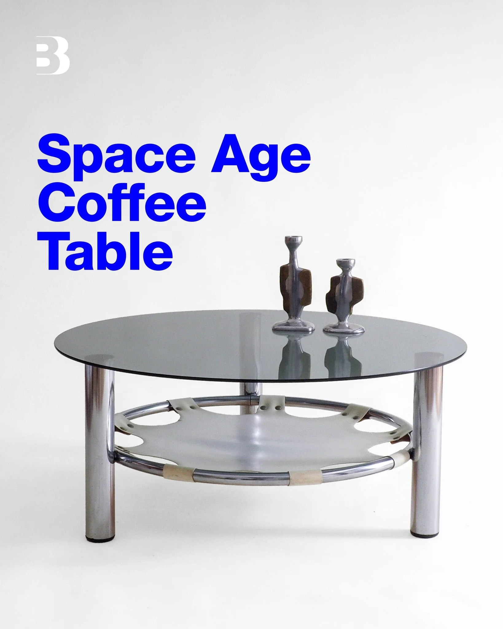 Space Age Glass and Chrome Coffee Table

This stunning space age coffee table is constructed with a sleek chrome structure, a beautifully polished glass top, and a stylish skai magazine holder. The retro-futuristic table is in good vintage condition,