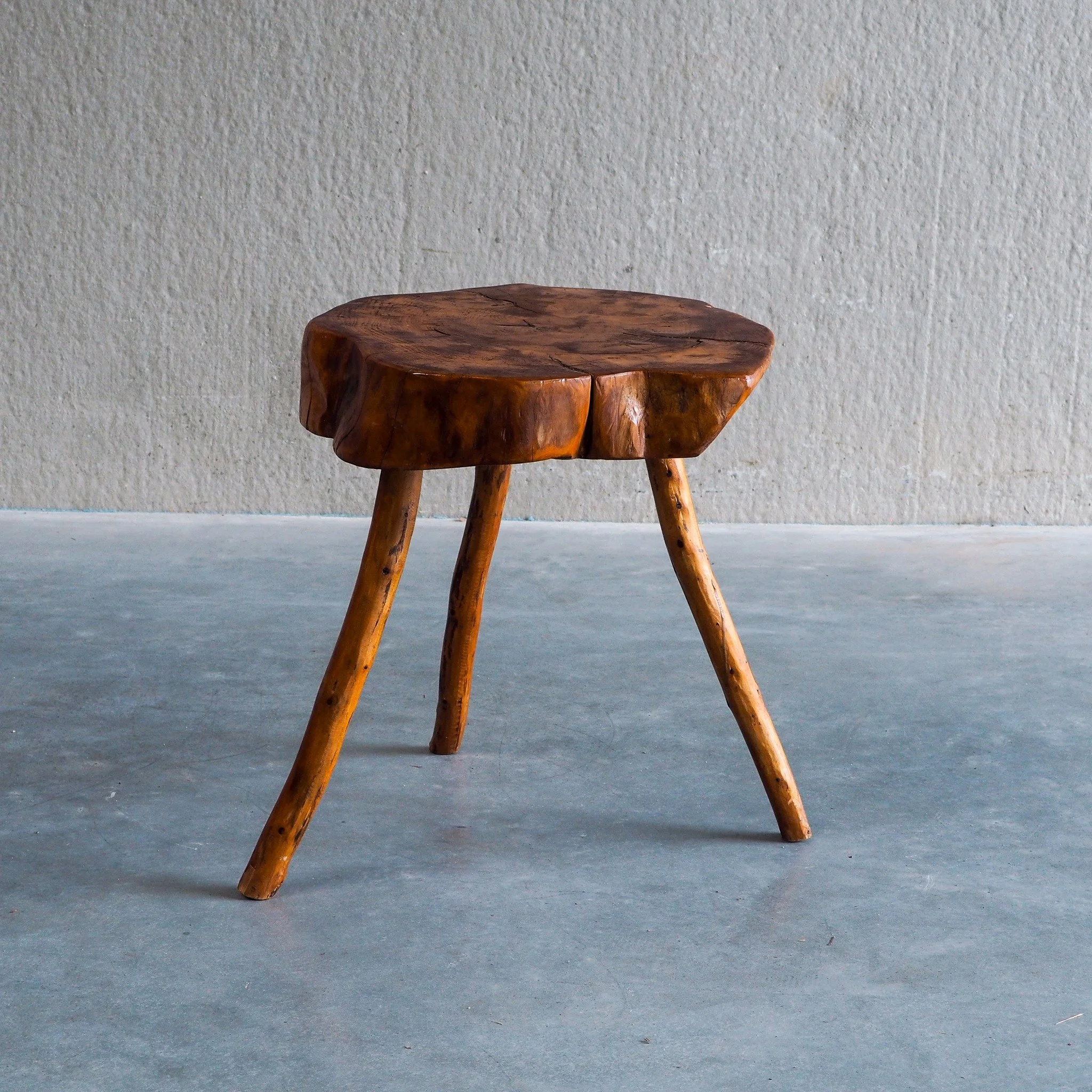 Vintage French Elm Wood Trunk Side Table

A magnificent example of French brutalist and rustic design, this large vintage side table brings authentic, raw organic texture to modern and classic interiors alike. Sourced in the south of France, the tabl