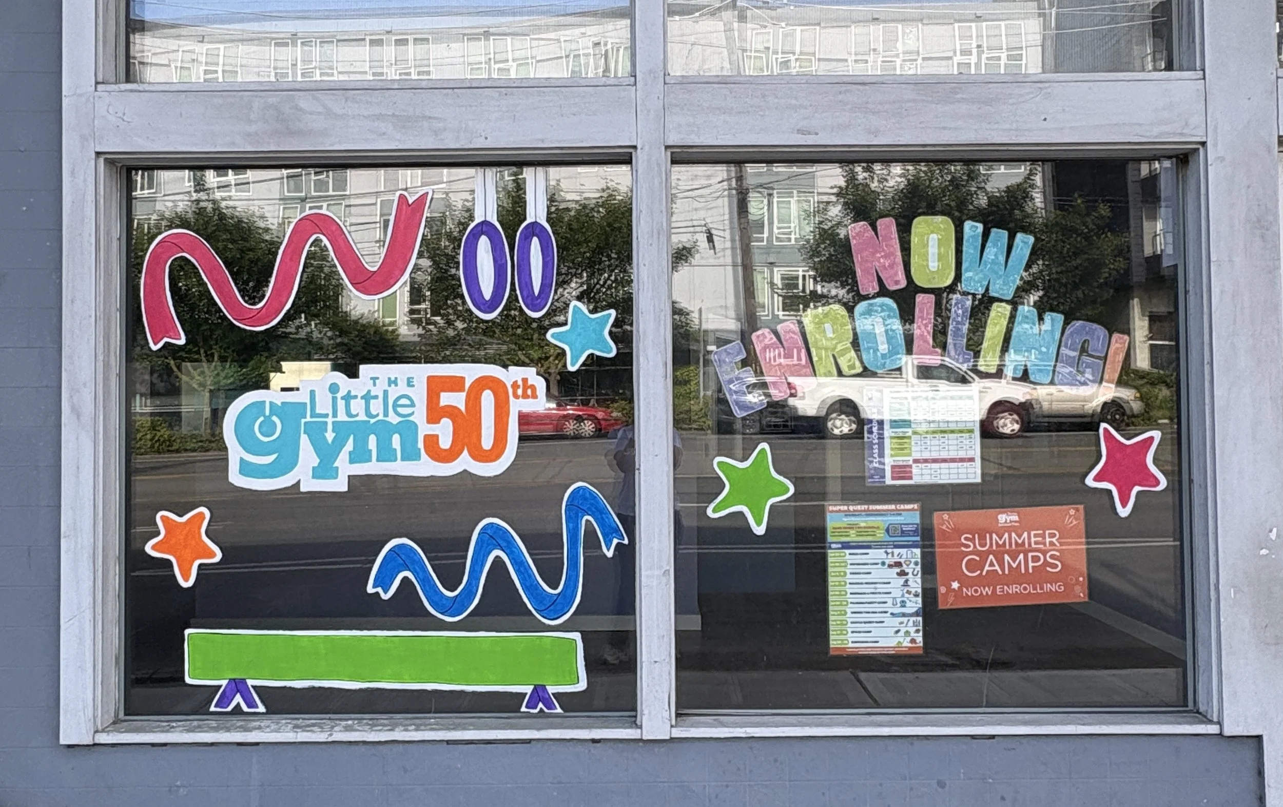 TLG 50th Anniversary Promo Window Painting, May 2026, north Seattle, approx. 5'x10' (for both windows)