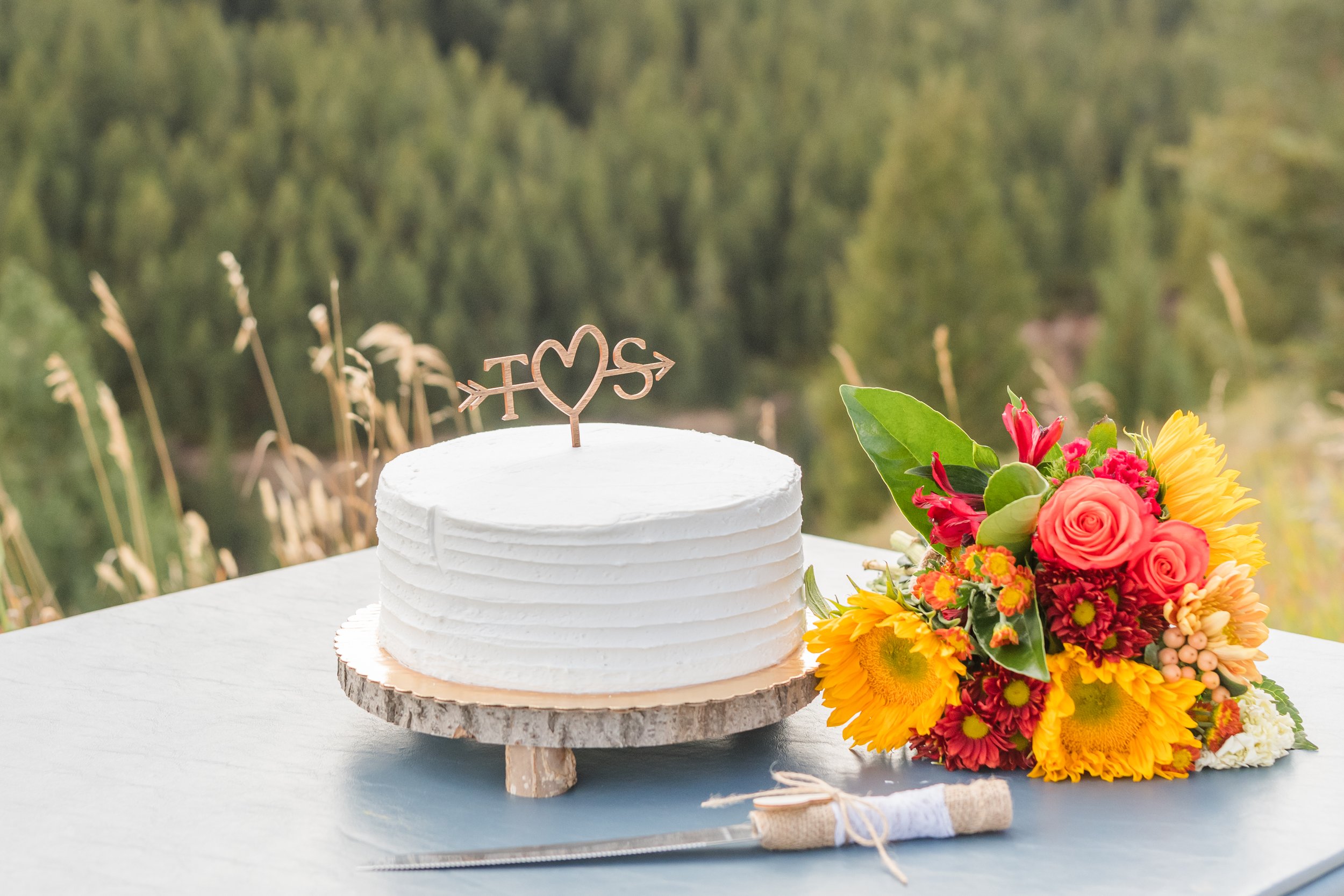 Wedding Cake and Floral Arrangement for Jackson Hole Elopement