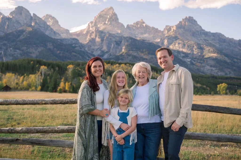family photography session with grandmother, mother, father, and two daughters in Jackson Hole under the Grand Tetons