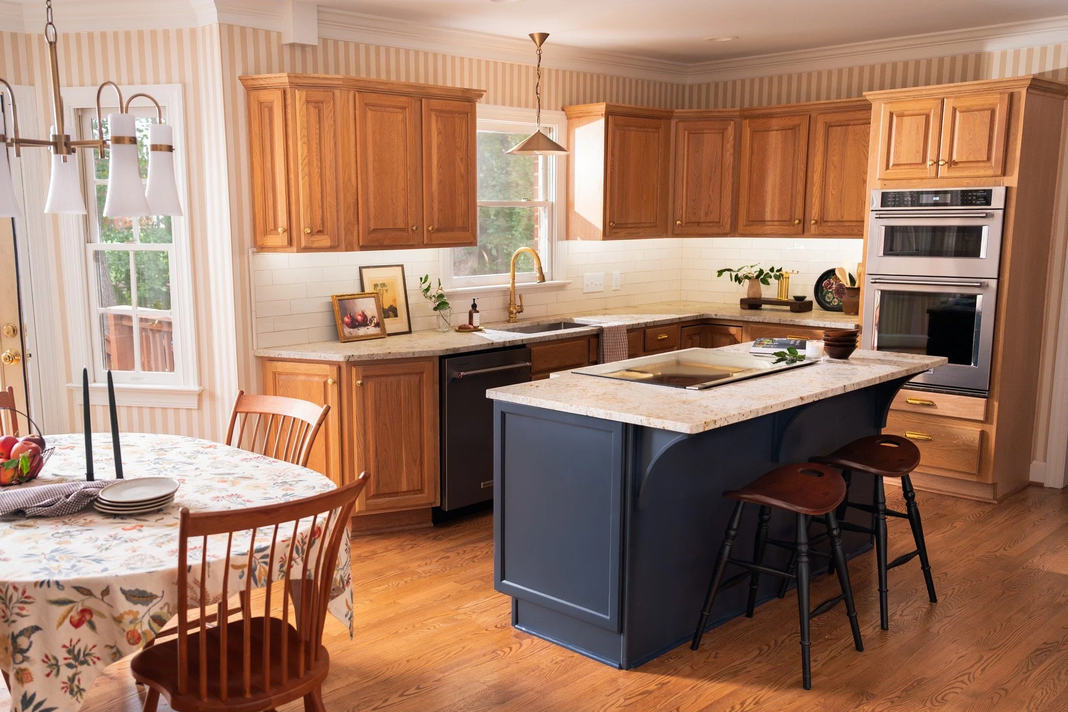 Starting from scratch isn't always the best solution, except when you're baking 😉

We kept the charm of our client's original kitchen, added some function with a bigger island, refinished (expensive and original) oak wood cabinets and floors, and re