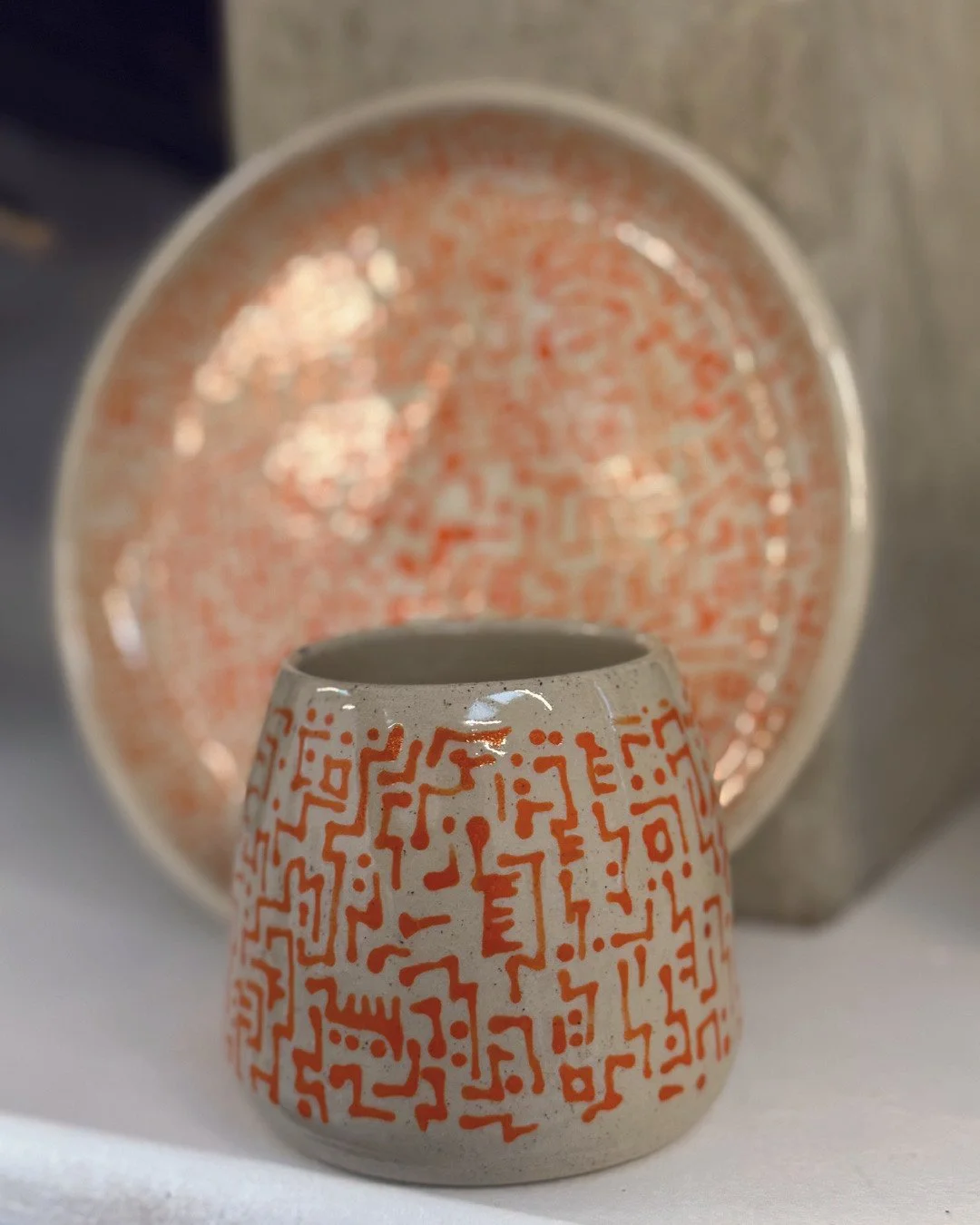 ✨Student Work✨⁠
⁠
Have you ever thought about creating a matching set?⁠
⁠
These plates, mug, and lampshade have been in the studio this week, catching our eye with their vibrant colours and intricate patterns. They&rsquo;re the work of student Harry,