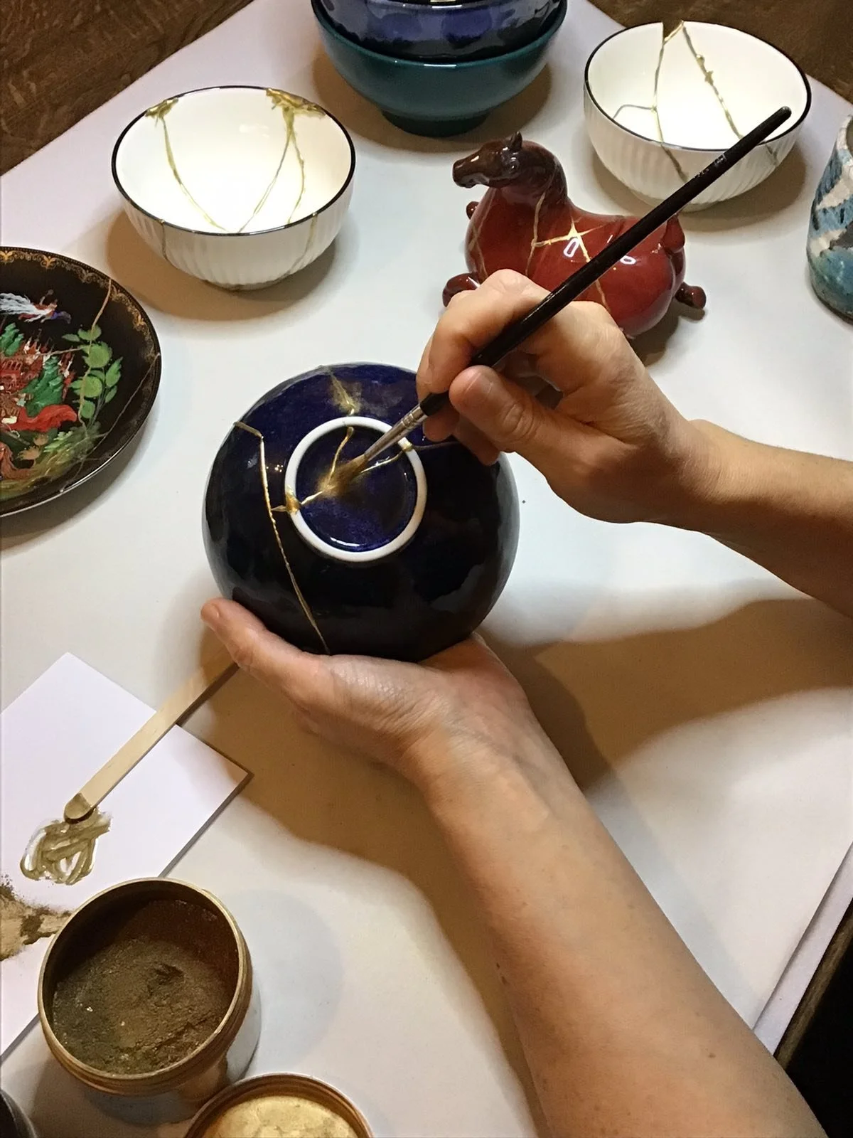 Applying bronze powder (1).jpg