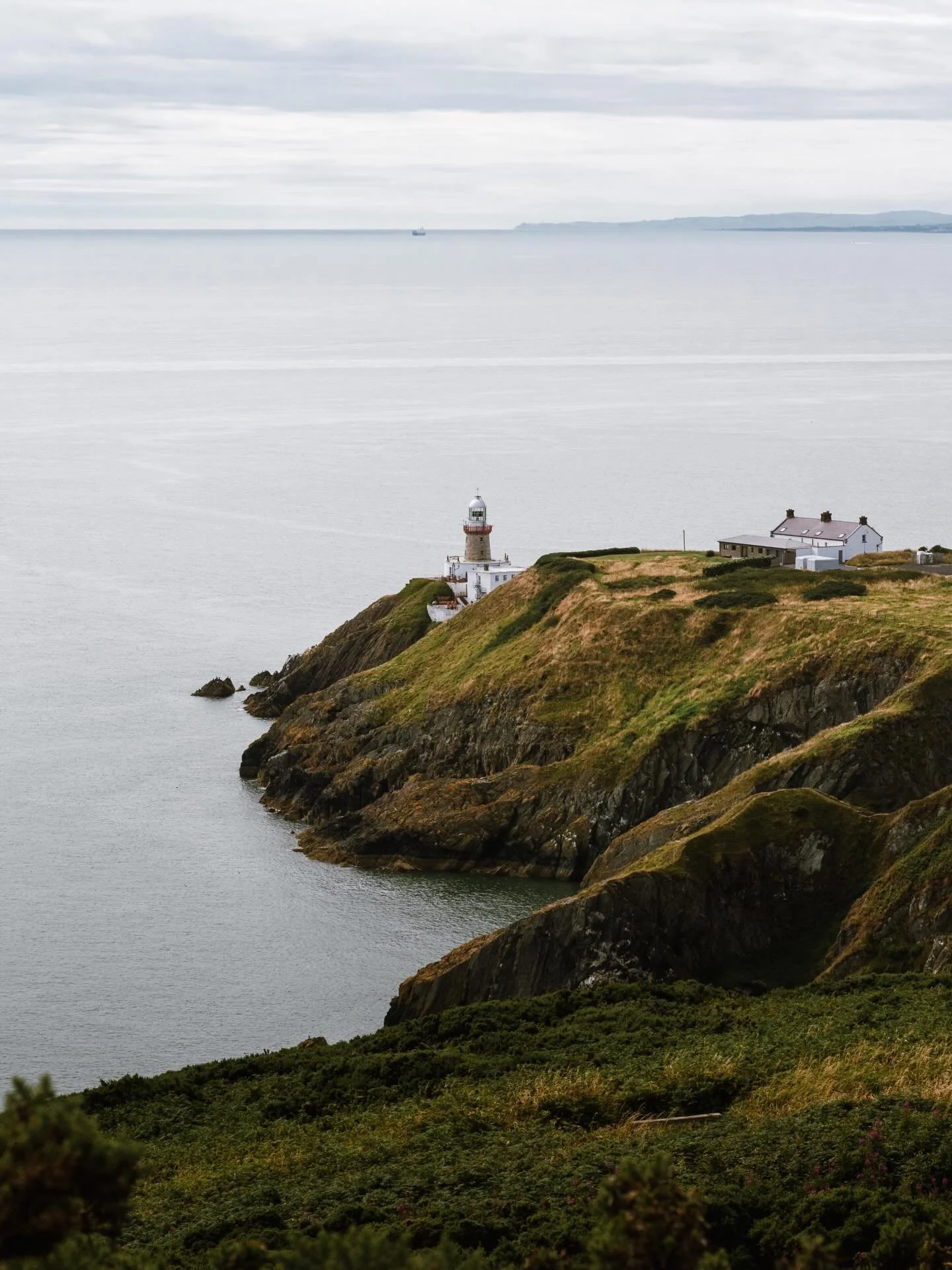 I took the train out of Dublin on a Tuesday morning with no plan. The forecast said overcast, which is exactly what I wanted.

The cliffs change completely depending on the light. That morning the sun broke through for about four minutes. This is fro
