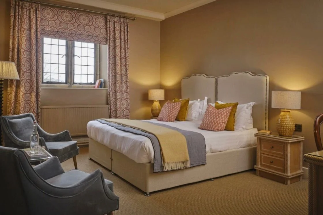 Hotel interior design project creating a refined boutique feel through material choice, colour and furniture selection