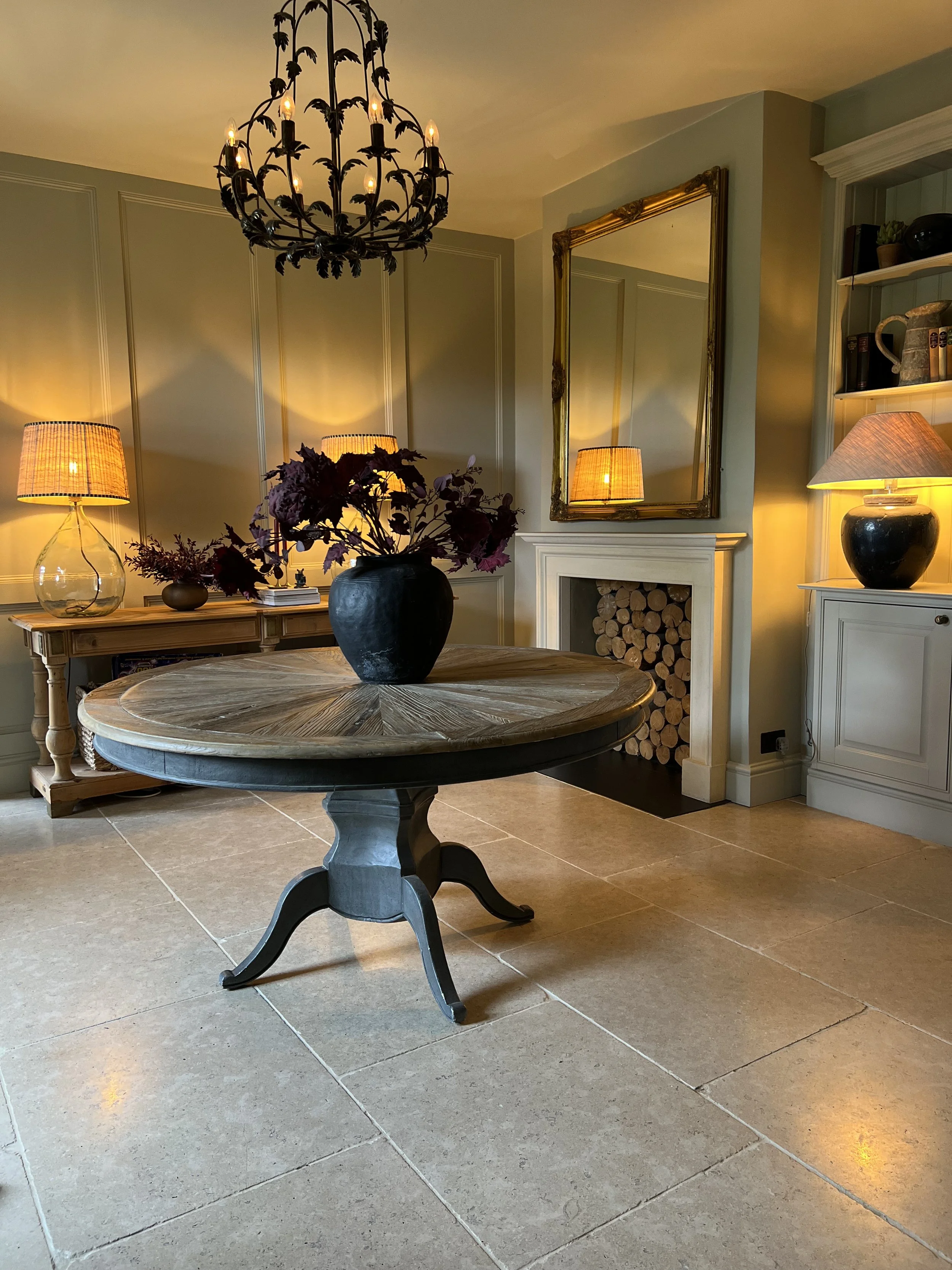 Cotswold country home interior design featuring layered neutral furnishings, natural materials and heritage architectural detailing