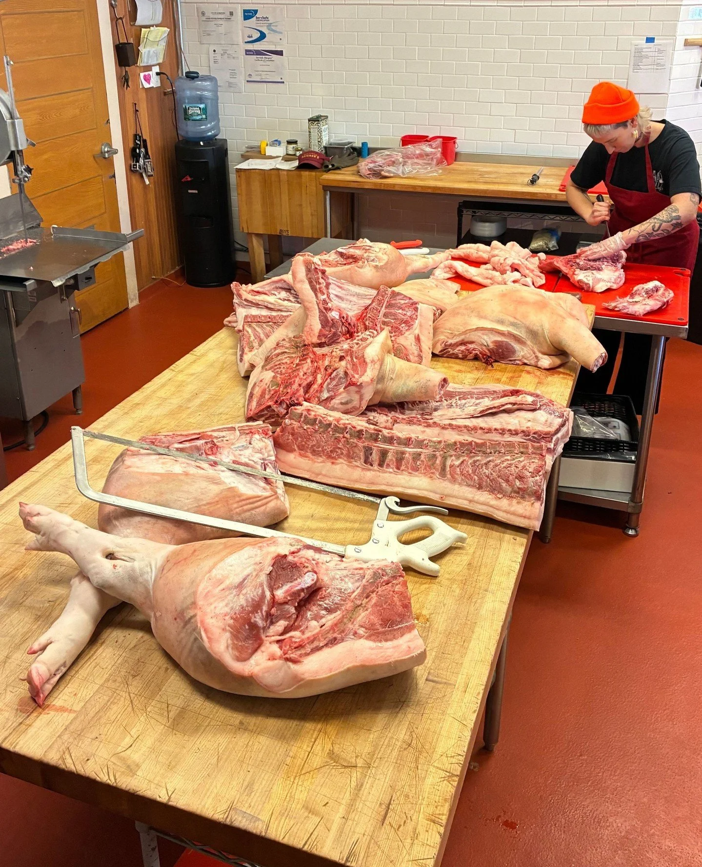 Your pork chop doesn't appear by magic. When a whole pig from Heritage Grazers in Vermont arrives at our Cambridge shop, the butchers get to work. Here Margaret is working her way through the pig, breaking it down into kitchen-ready cuts. ⁠
⁠
The eth