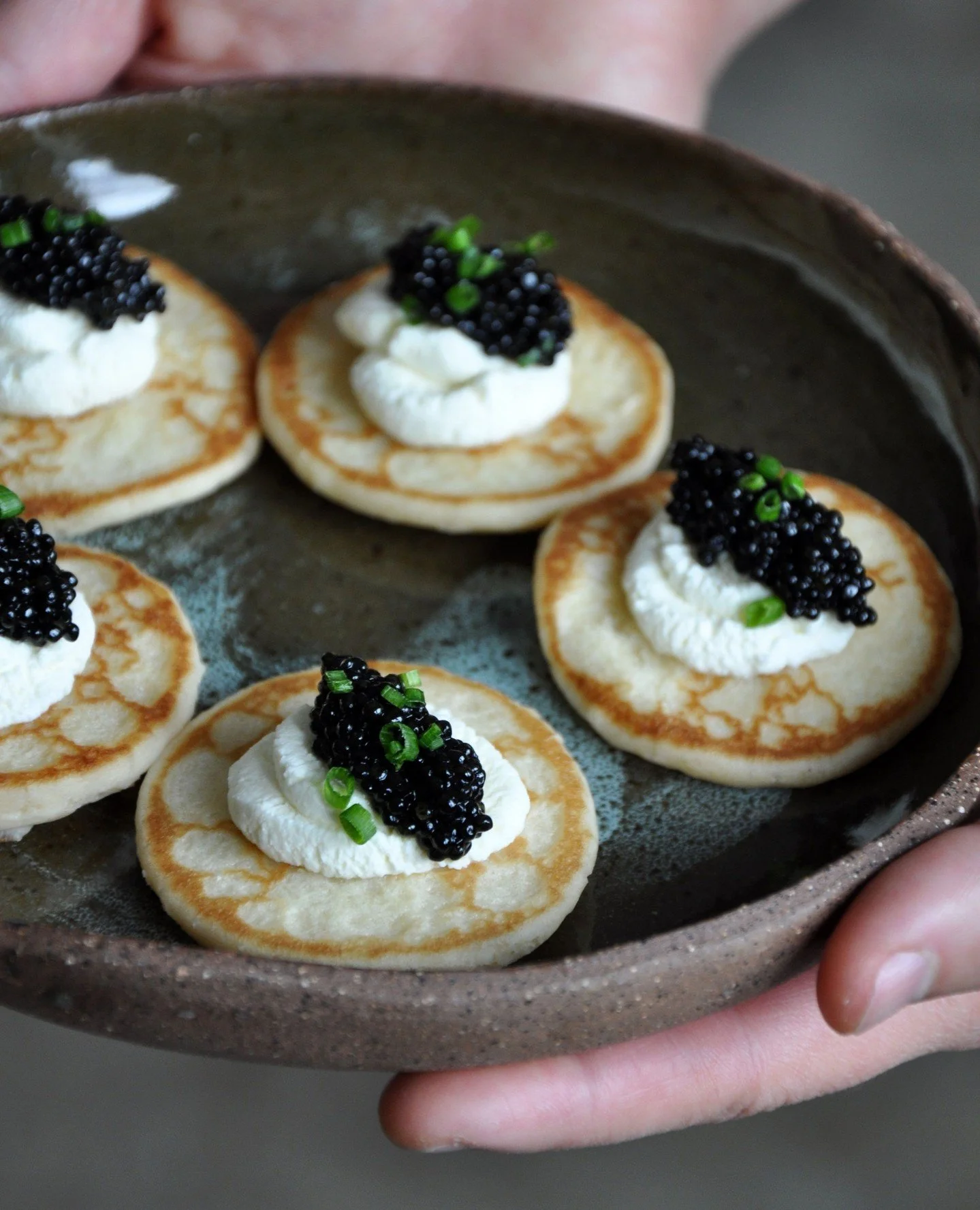 It's all about those snacks. The best part of the holiday is all the delicious things to eat before you even get to the table. What's on your spread?⁠
⁠
Pictured here: Wulf's Fish caviar on blinis, duck pastrami, shrimp cocktail, duck rillette⁠
⁠
#bu