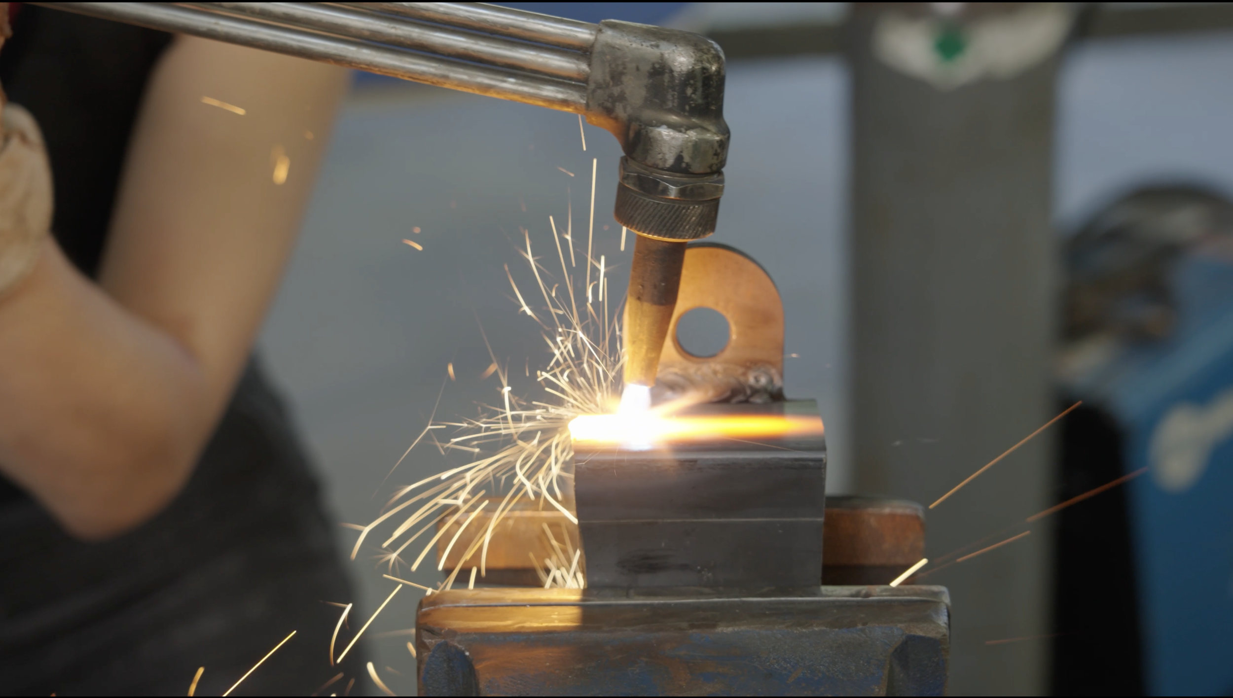 Close-up of metal welding with sparks during an artist residency at 20 Manor studio in Westchester County, Upstate New York