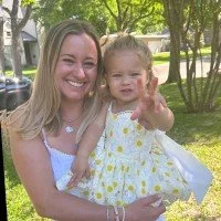 Lauren Gage holding her daughter