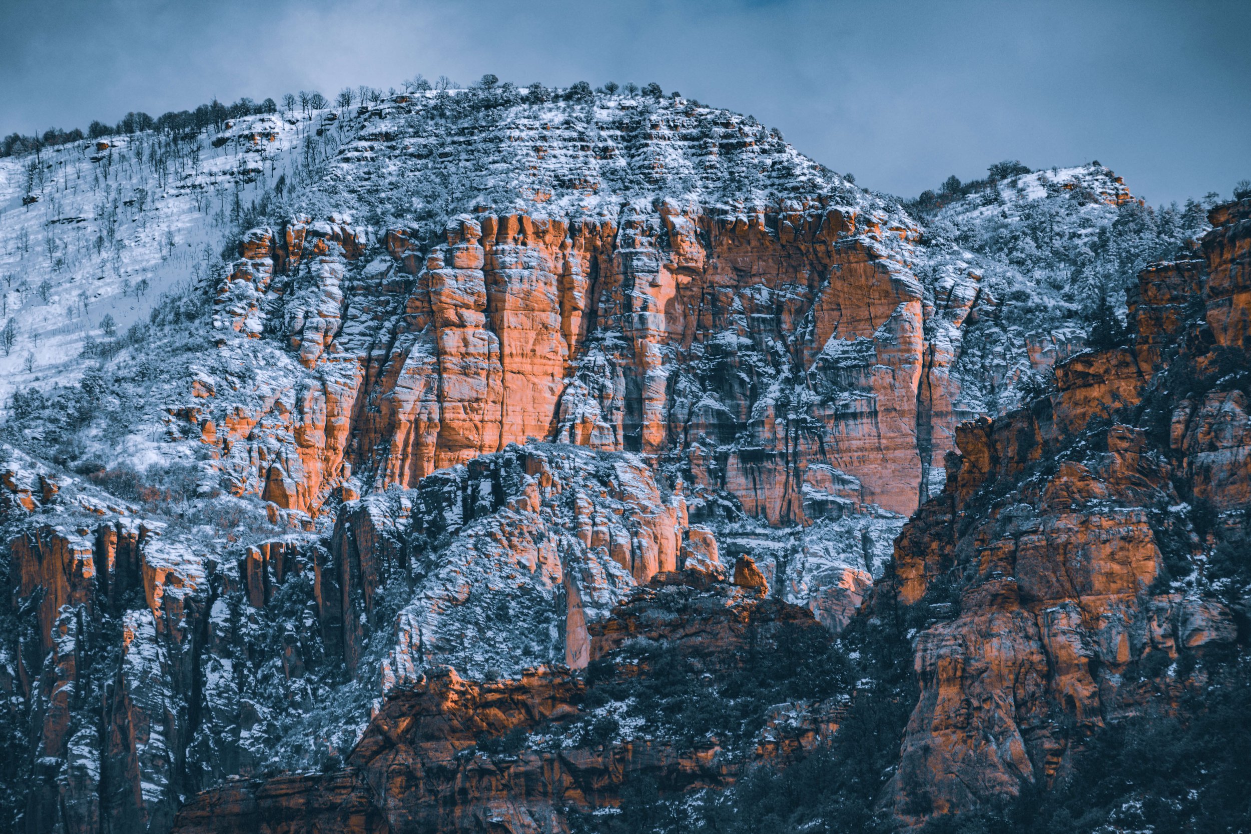 Red Rocks of Sedona, Arizona, at sunset, lightly covered in snow, high desert, Northern Arizona, USA, clouds, hiking, US Highway 89-A, Oak Creek Canyon.
