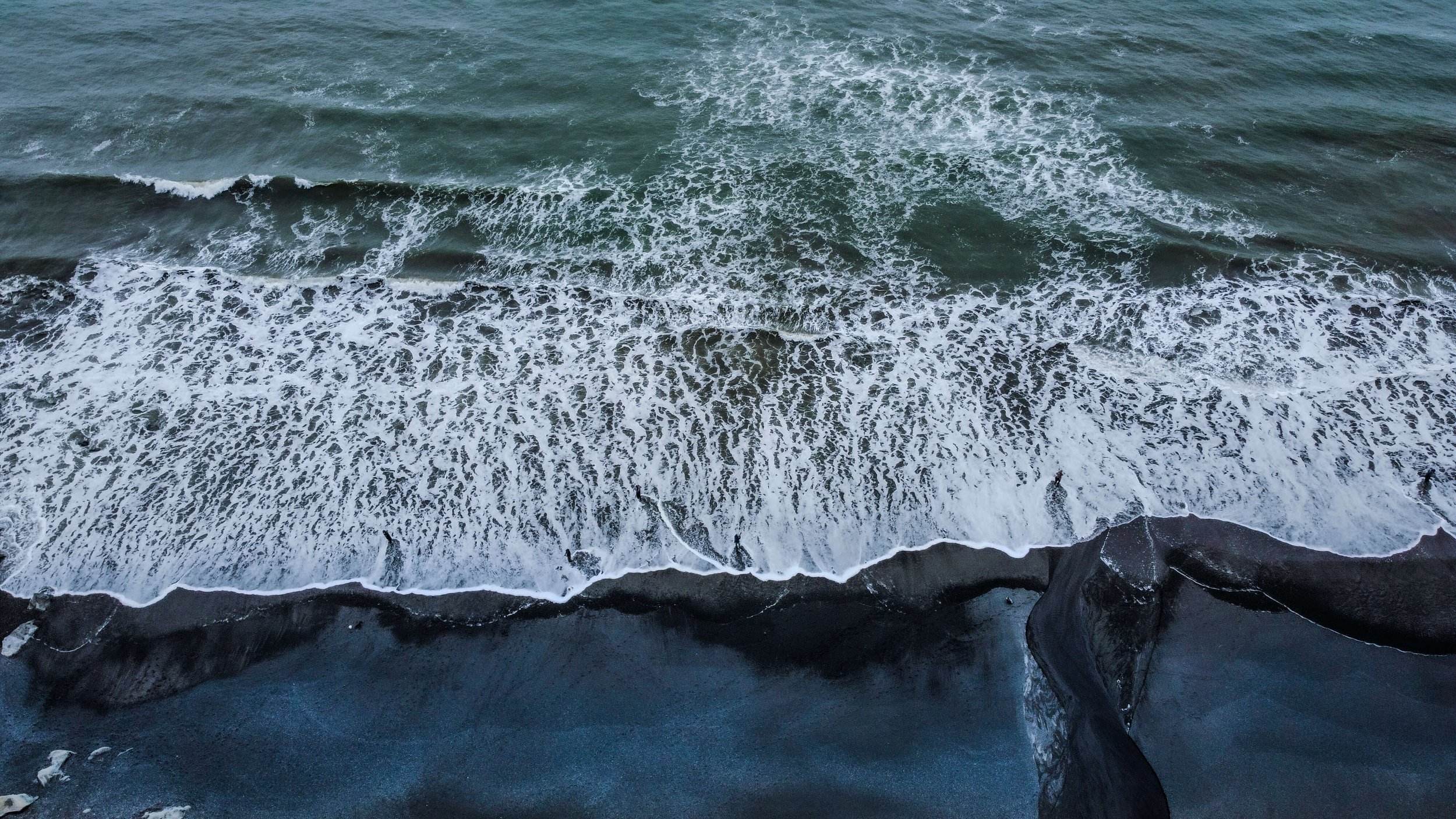 Pacific Northwest, Washington State, USA, Pacific Ocean, shore break, drone photography, black sands, waves breaking on beach, Olympic National Park. shore fishing, fishermen.