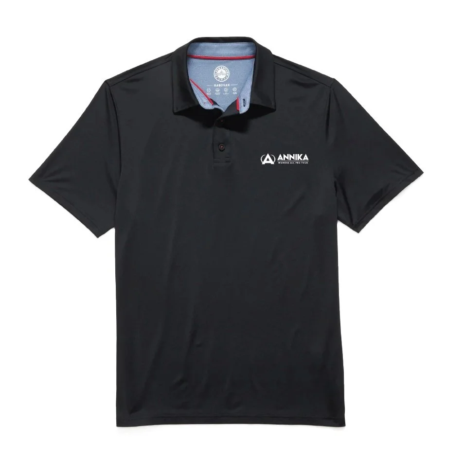 AWAPT25_Flag&AnthemPinehurstPoloMens_Black_AnnikaLogo.jpg