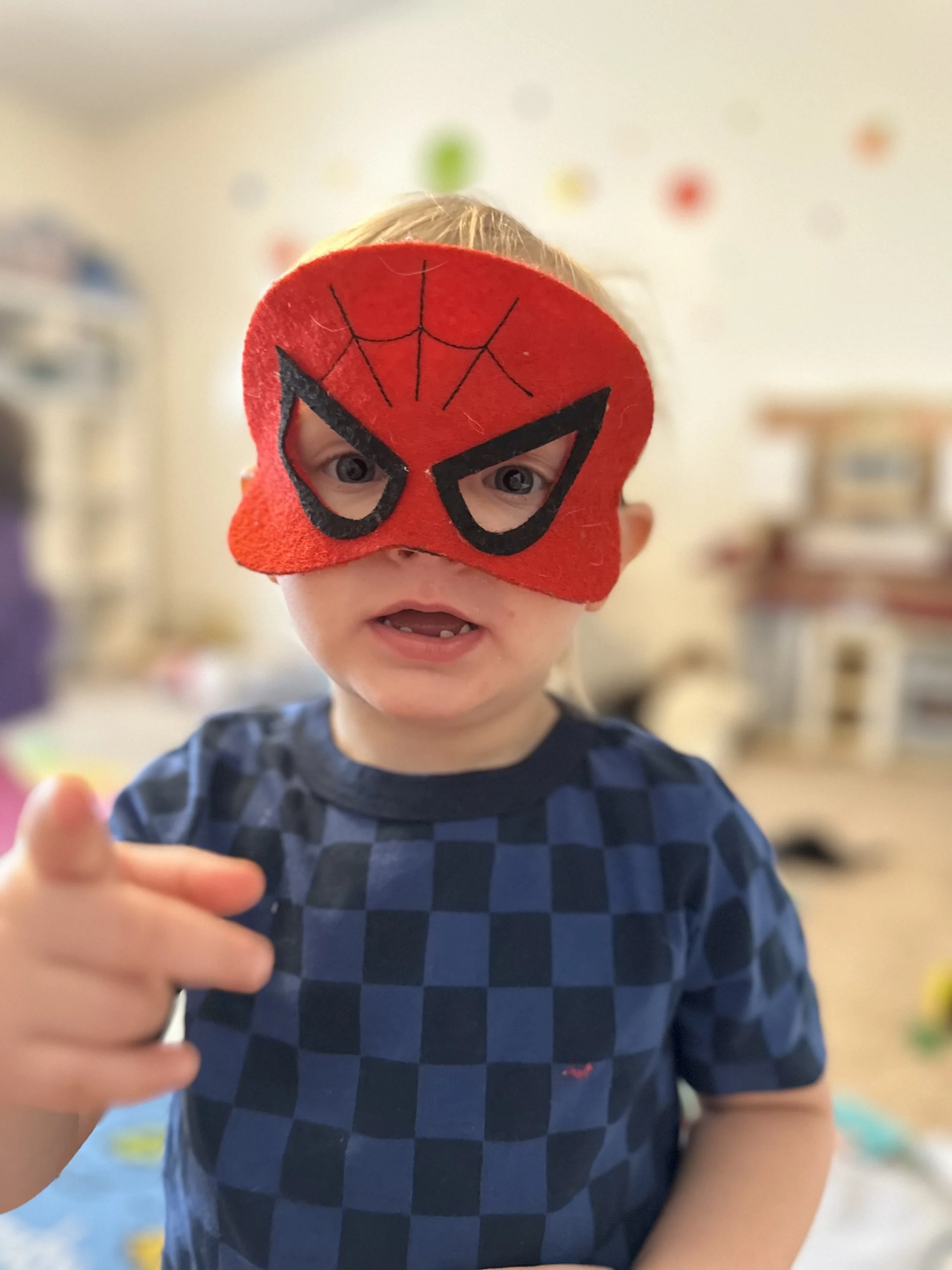 child dressed as spider man at Kingdom Care Preschool