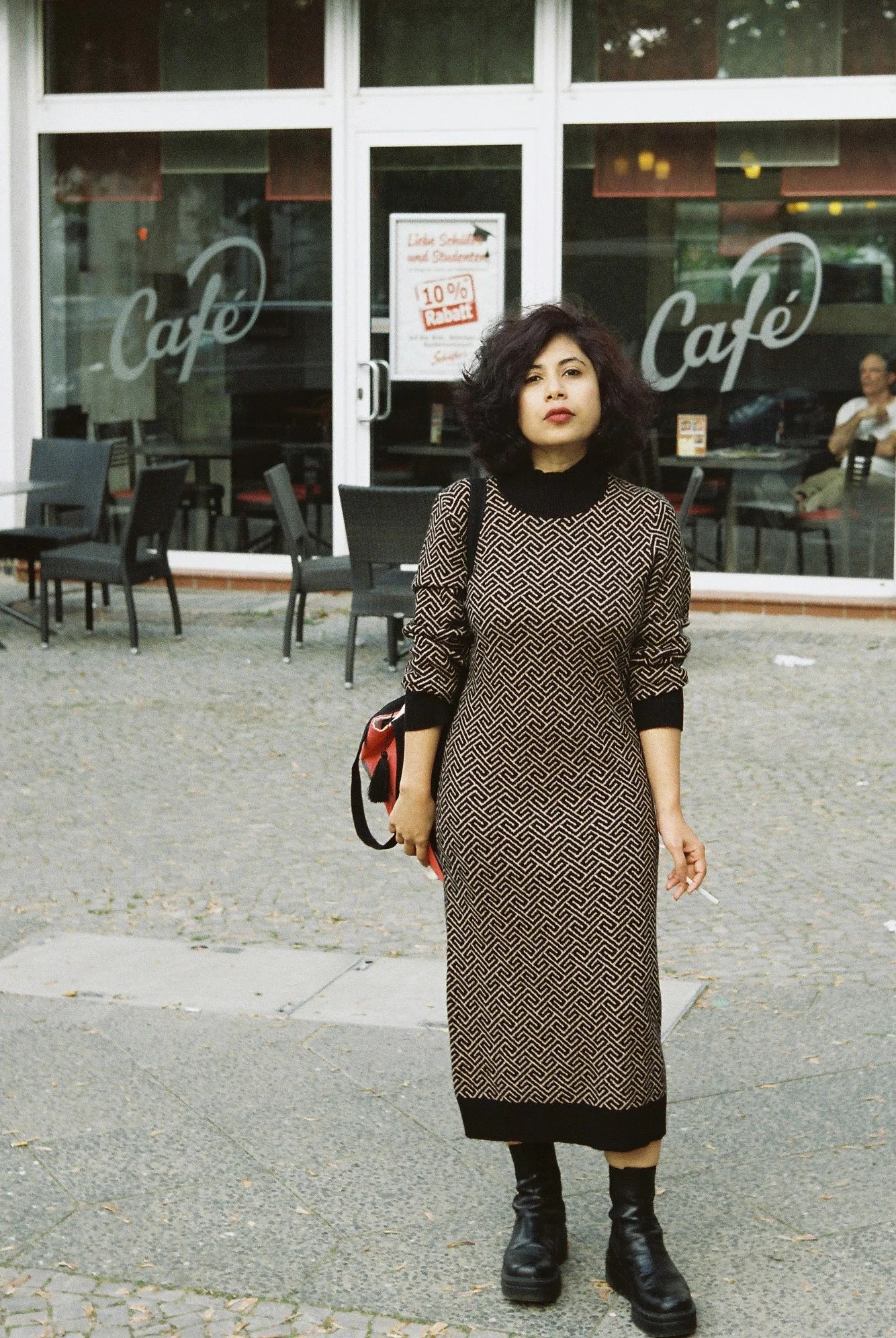 The Girl in Front of the Cafe