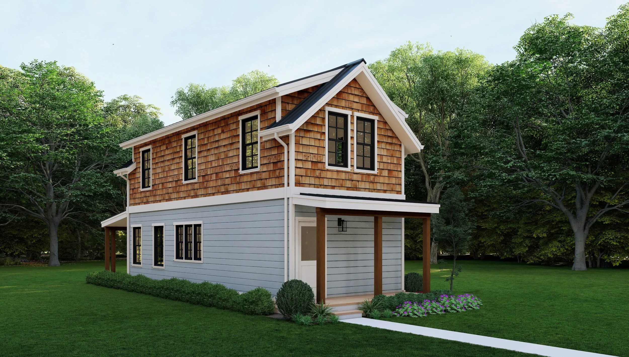 A two-story house with a gray lower level, wooden upper level, and black-framed windows, surrounded by a green lawn and trees under a blue sky.