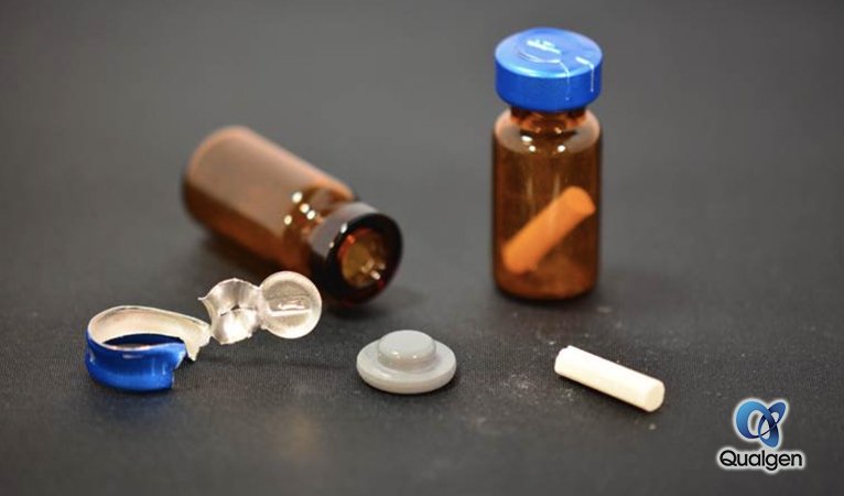 sterile bottle of testosterone pellets opened, white cylindrical pellets