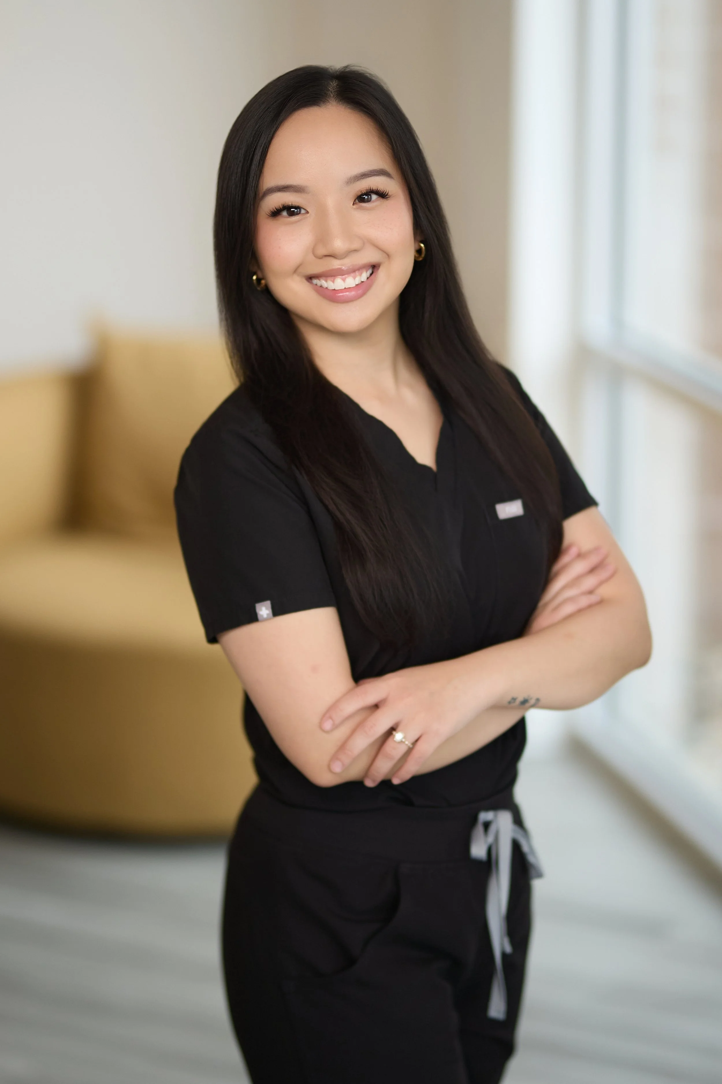Emily Bui Physician Assistant in scrubs