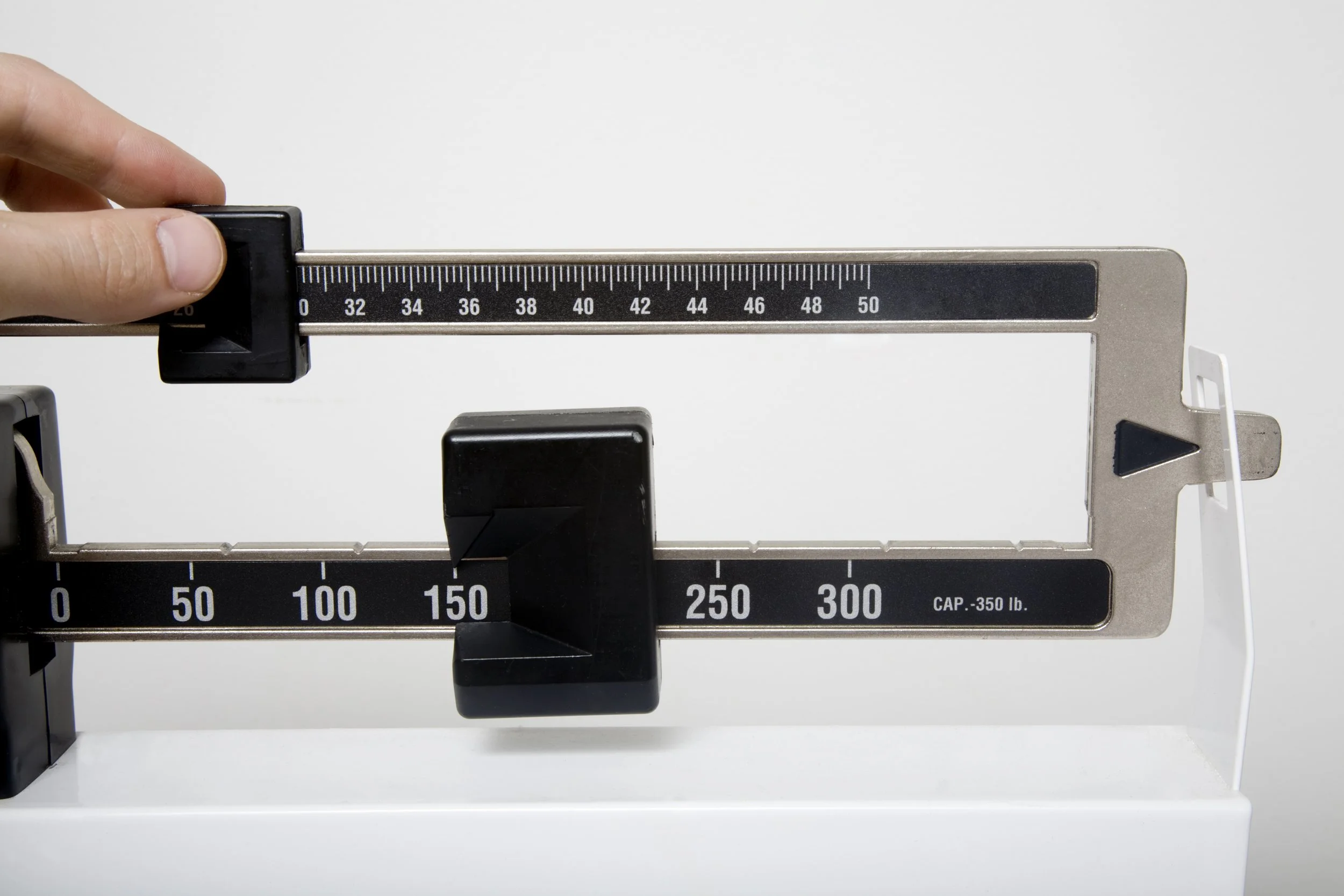 bar beam scale showing weight loss