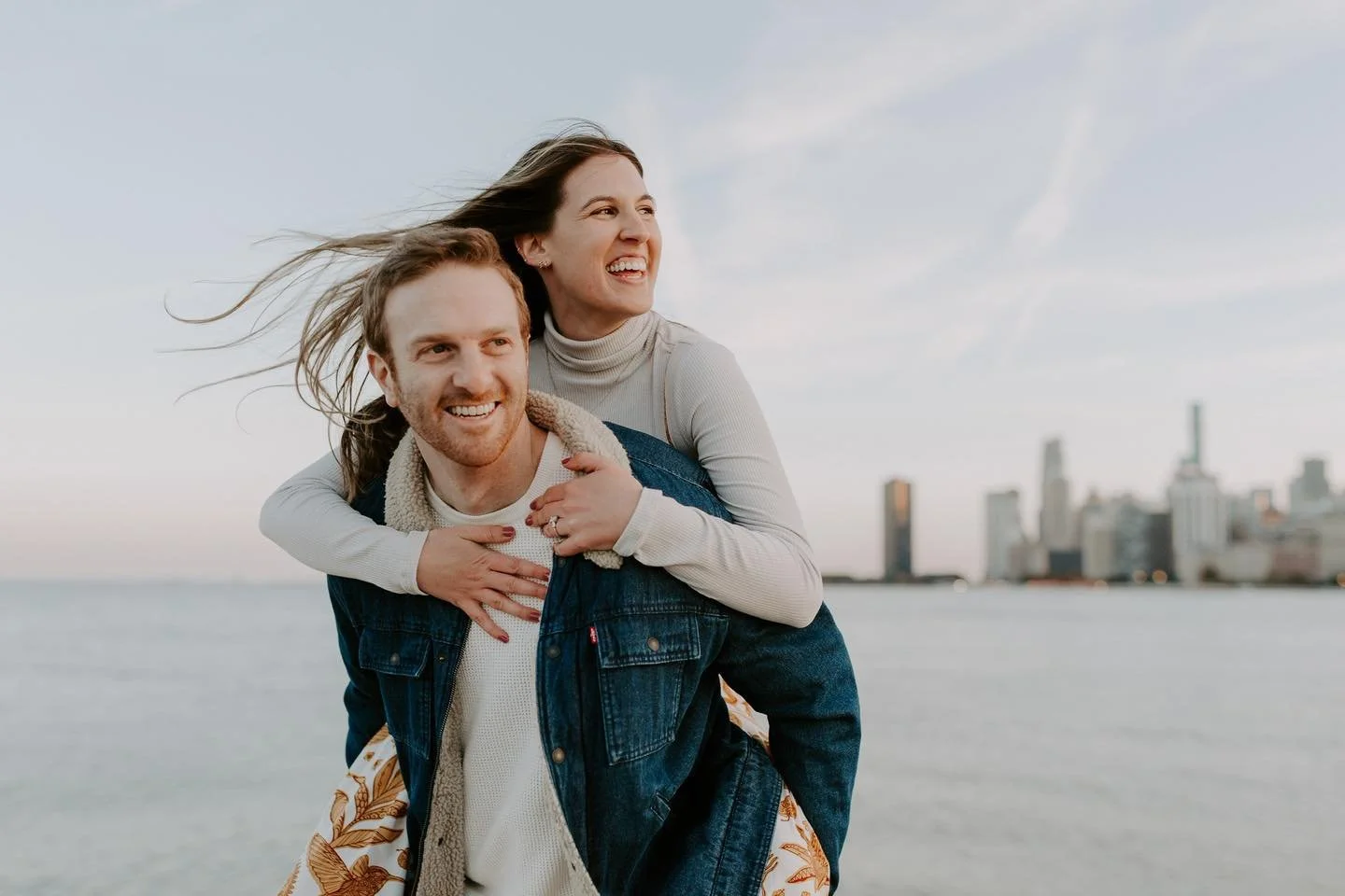 When lakefront breezes meet love and laughter &mdash; you get this kind of magic! We had the most fun exploring Chicago with these two lovebirds during their engagement session. From piggyback rides to wind-swept hair and nonstop giggles, it&rsquo;s 
