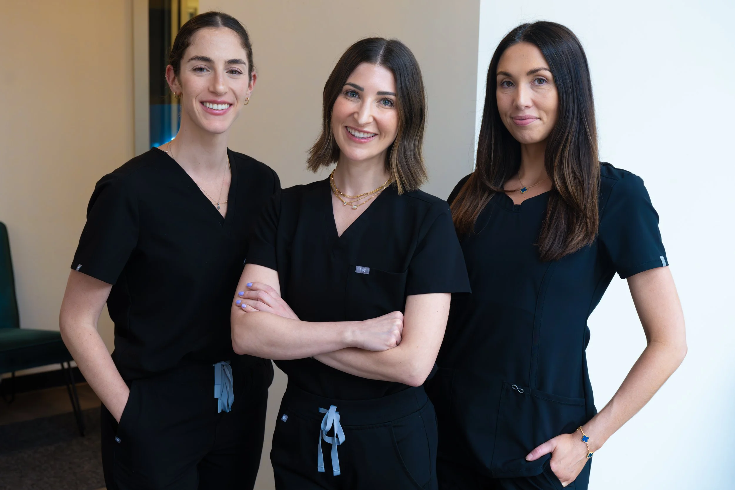 Clean, professional medical spa treatment room with neutral tones at Real Skin Aesthetics in Highland Park