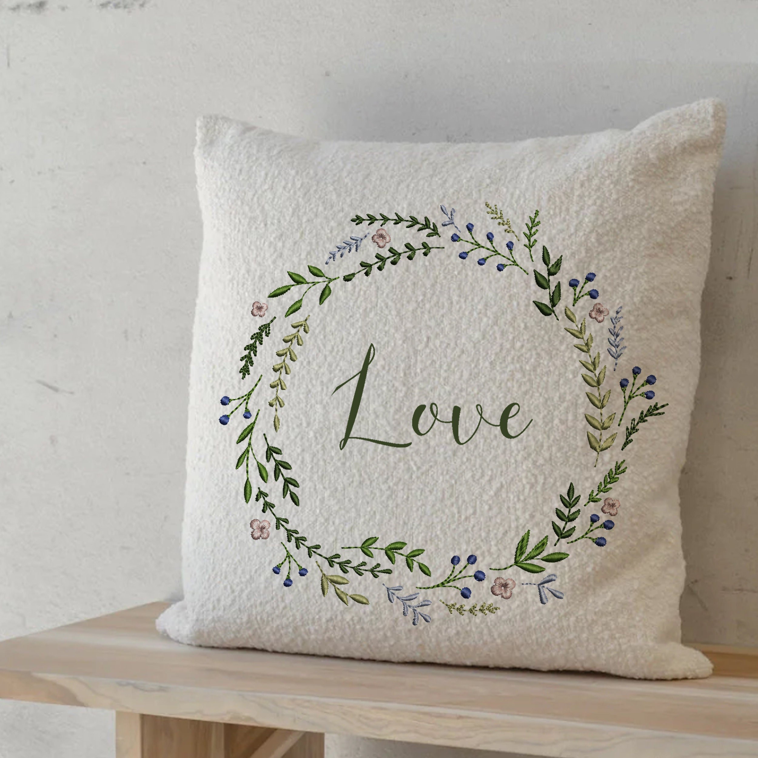 Beauty Wreath and Border Machine Embroidery Design embroidered on a pillow
