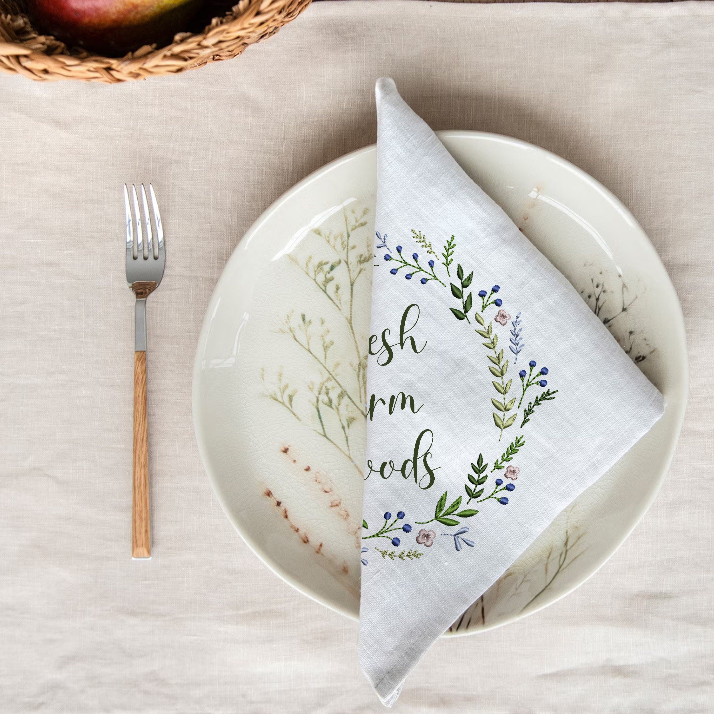 Beauty Wreath and Border Machine Embroidery Design embroidered on a table napkin