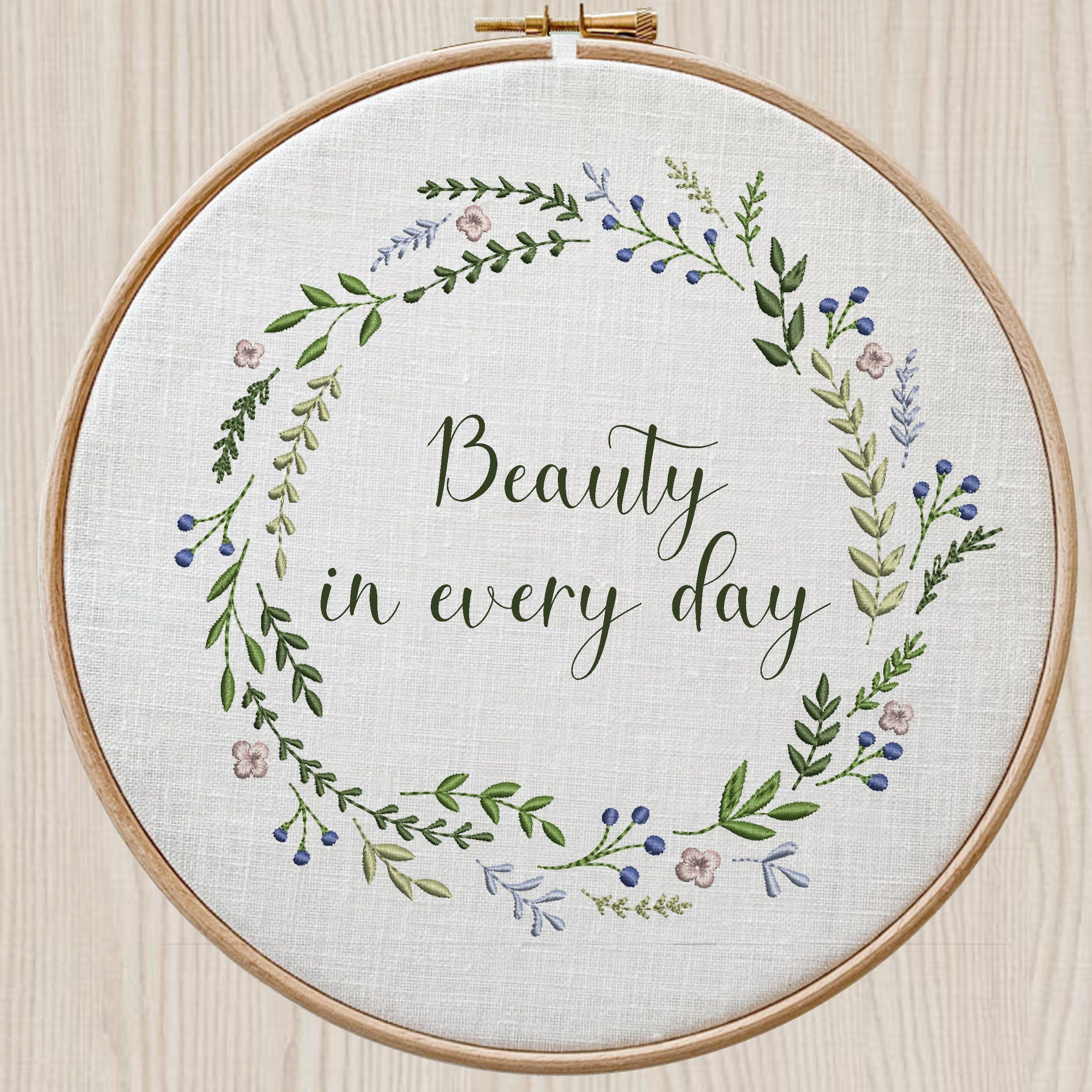 Beauty Wreath and Border Machine Embroidery Design embroidered on a hoop