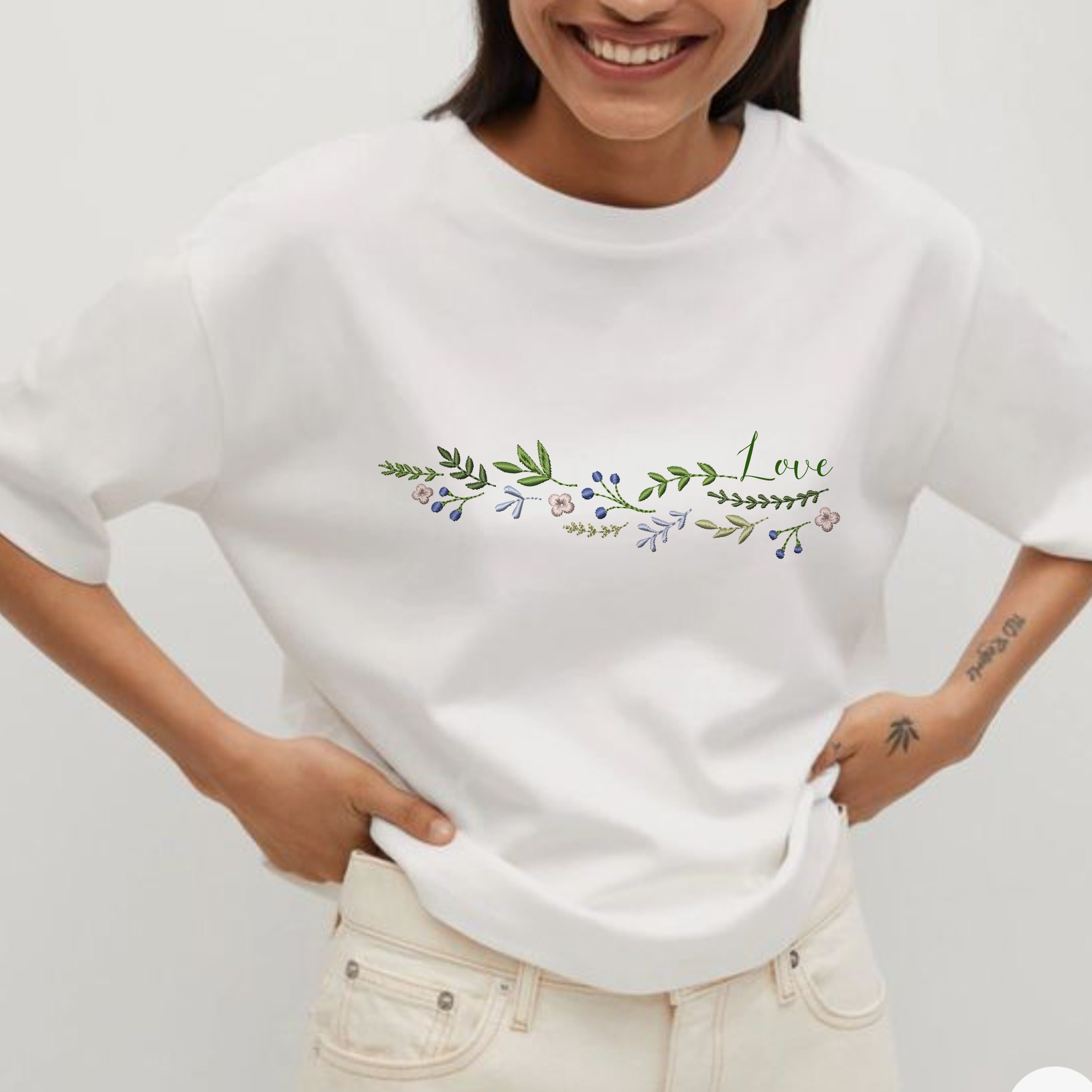 Beauty Wreath and Border Machine Embroidery Design embroidered on a t-shirt