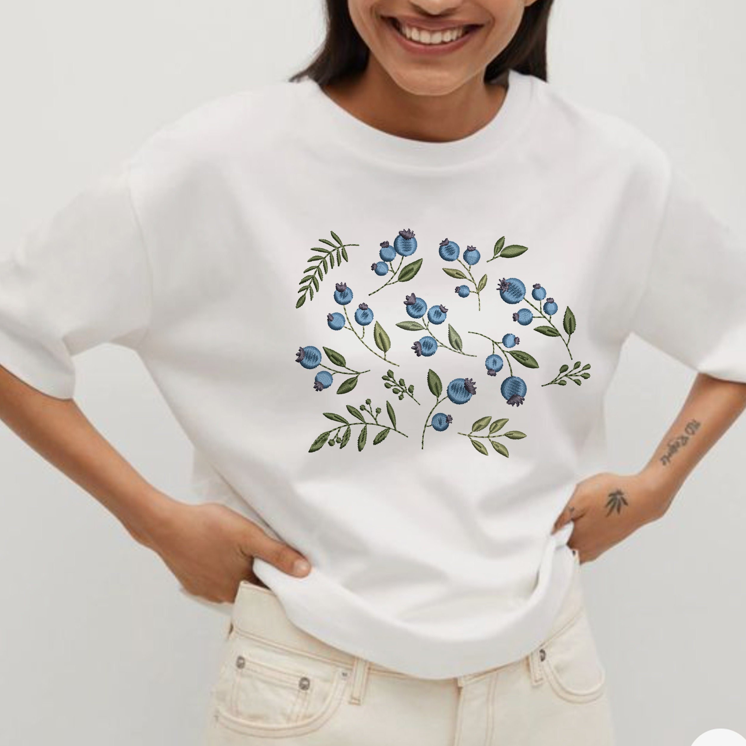 16 Blueberry Branches Machine Embroidery Design File embroidered on a white t-shirt