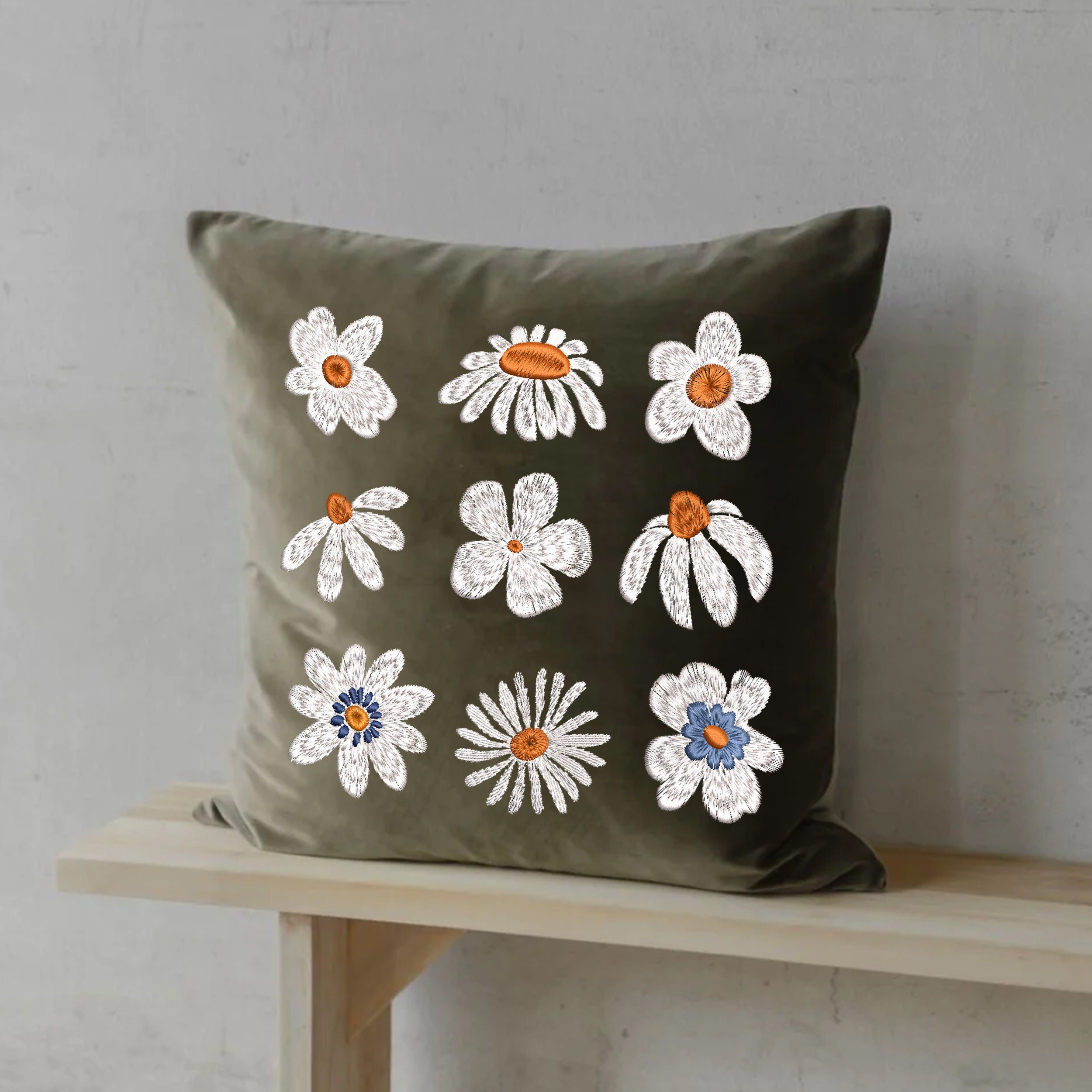 50 Mini Tiny Small Unique Flower Bundle Machine Embroidery Design embroidered on a square pillow