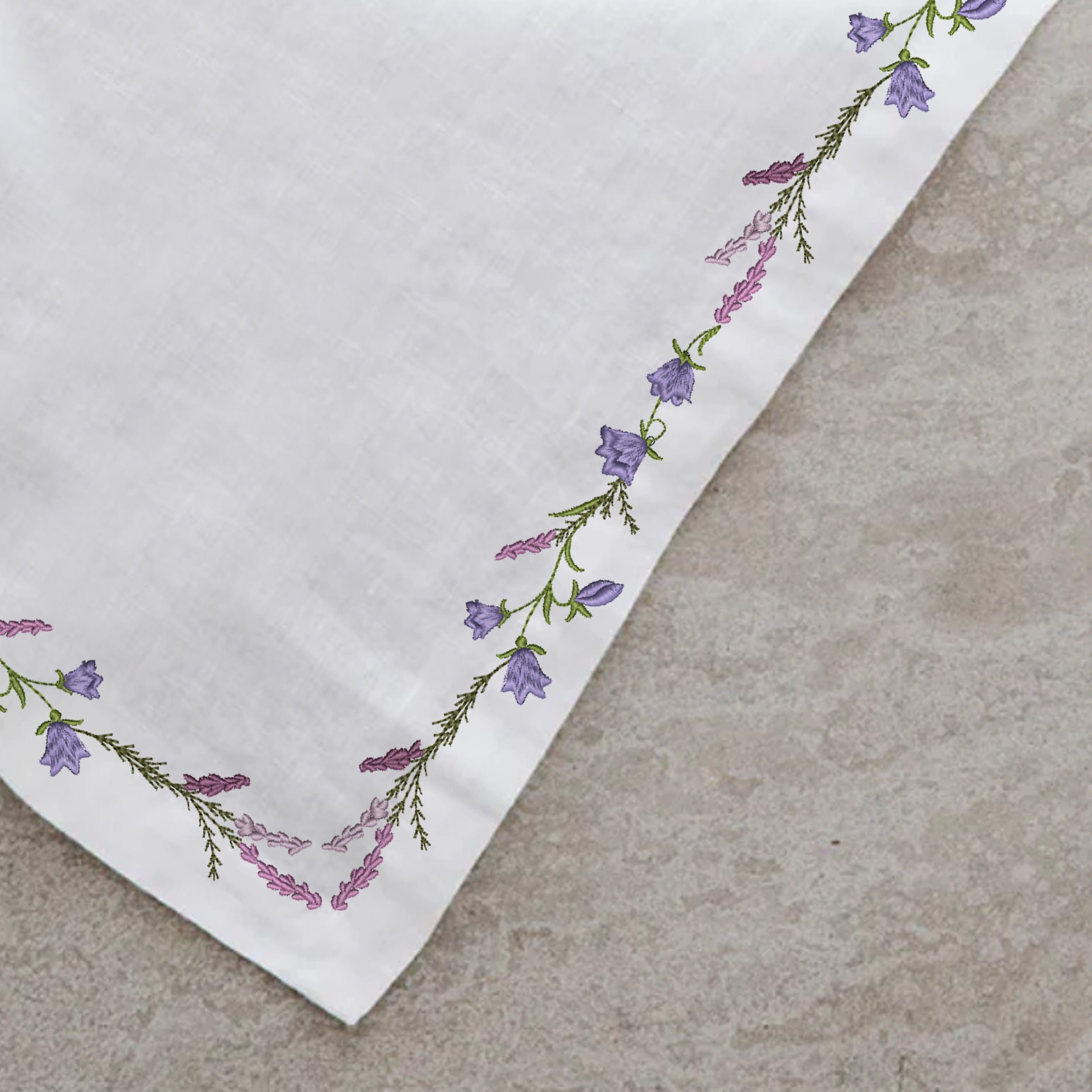 Harebells and Heather Flower Wreath, Border and Branch Machine Embroidery Design file embroidered on a towel