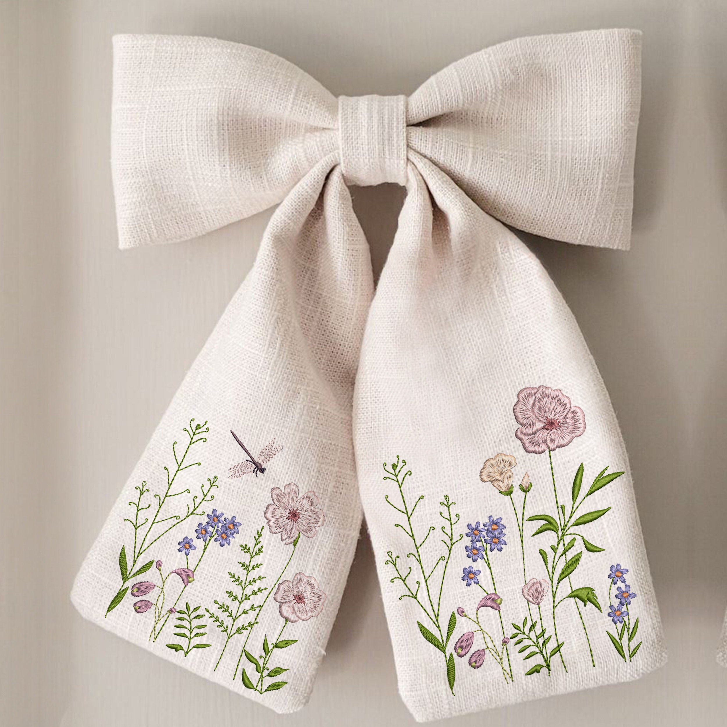 Summer Day Flower Machine Embroidery Design File embroidered on a bow