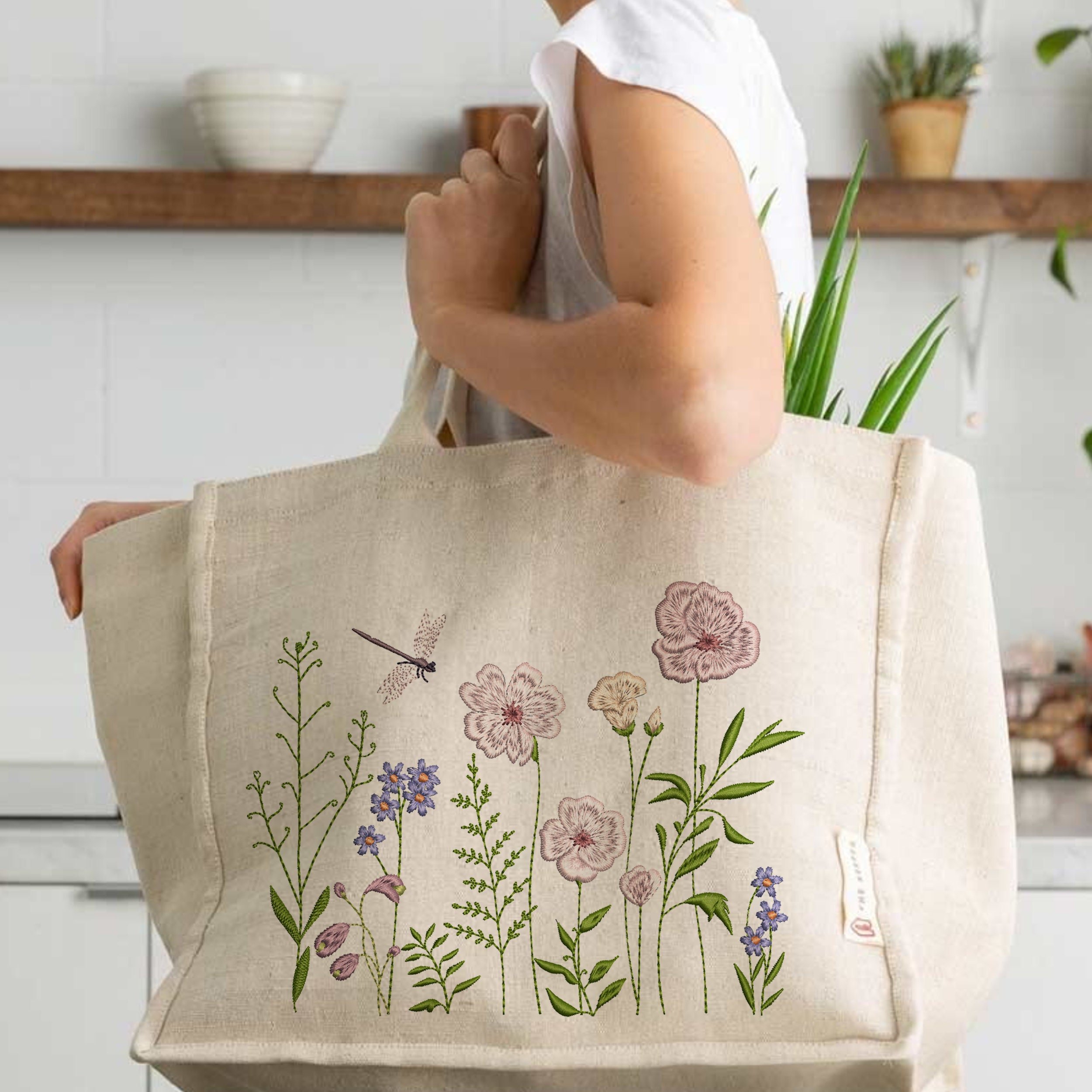 Summer Day Flower Machine Embroidery Design File embroidered on a handbag