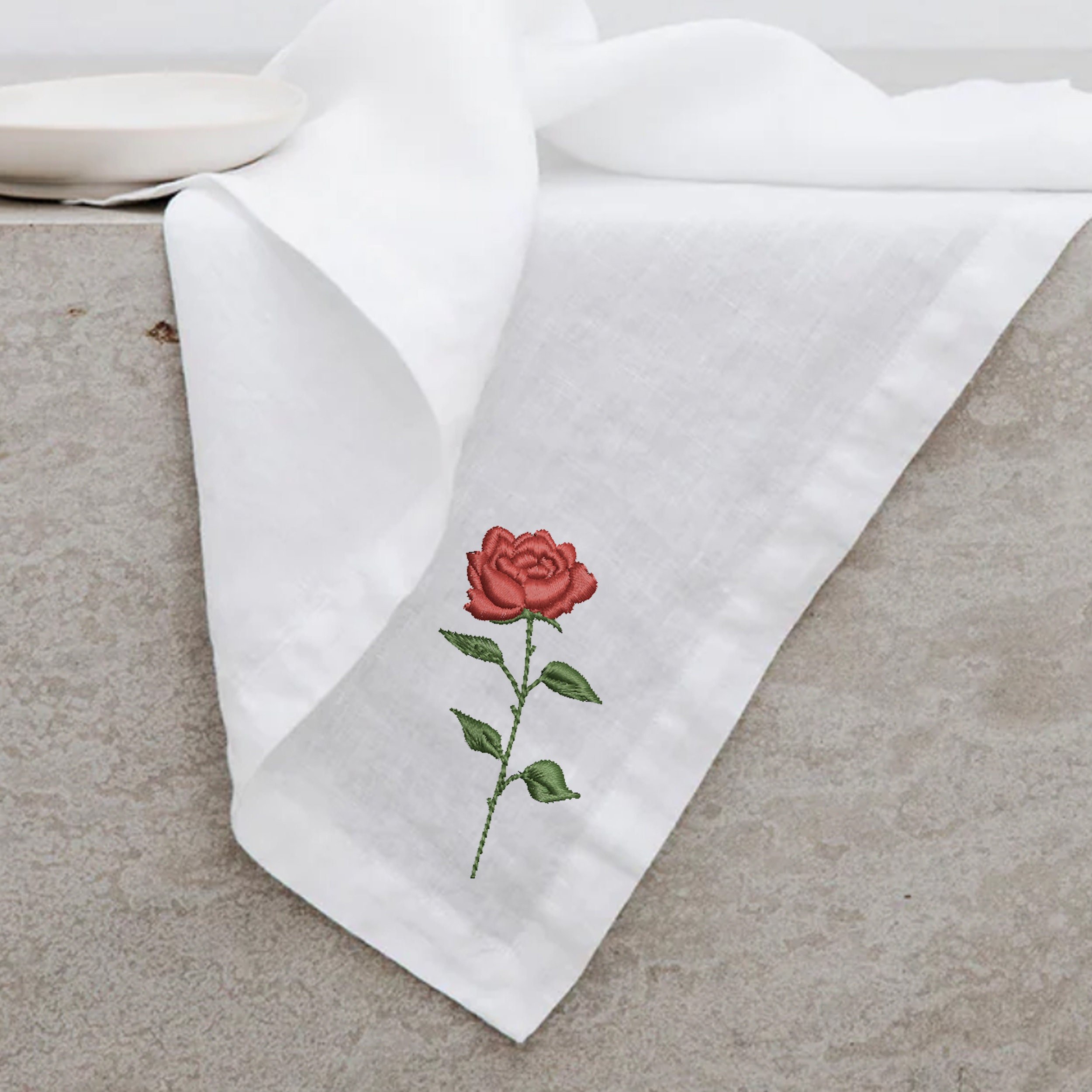 12 Rose Flowers Machine Embroidery Design embroidered on a kitchen table runner