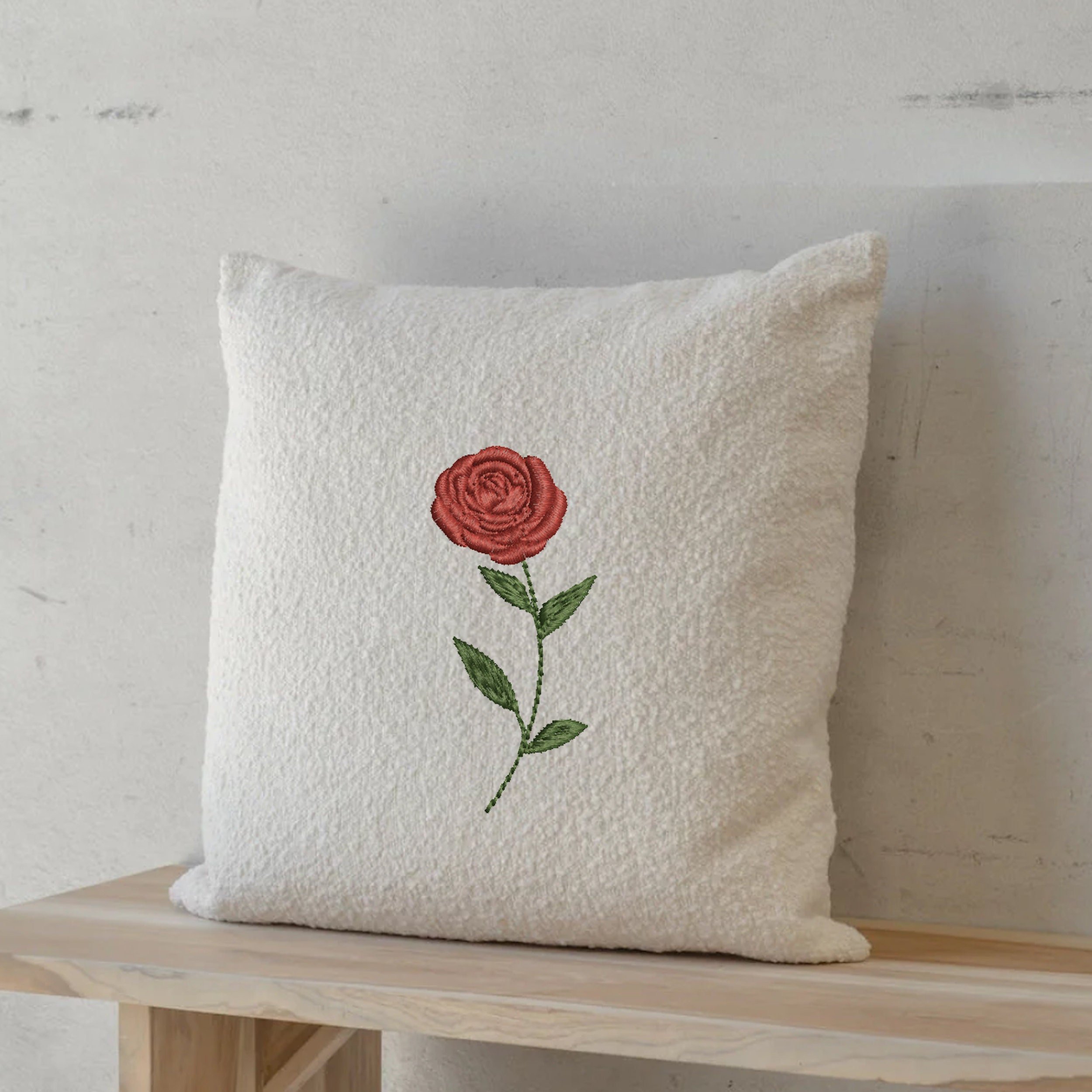 12 Rose Flowers Machine Embroidery Design embroidered on a pillow