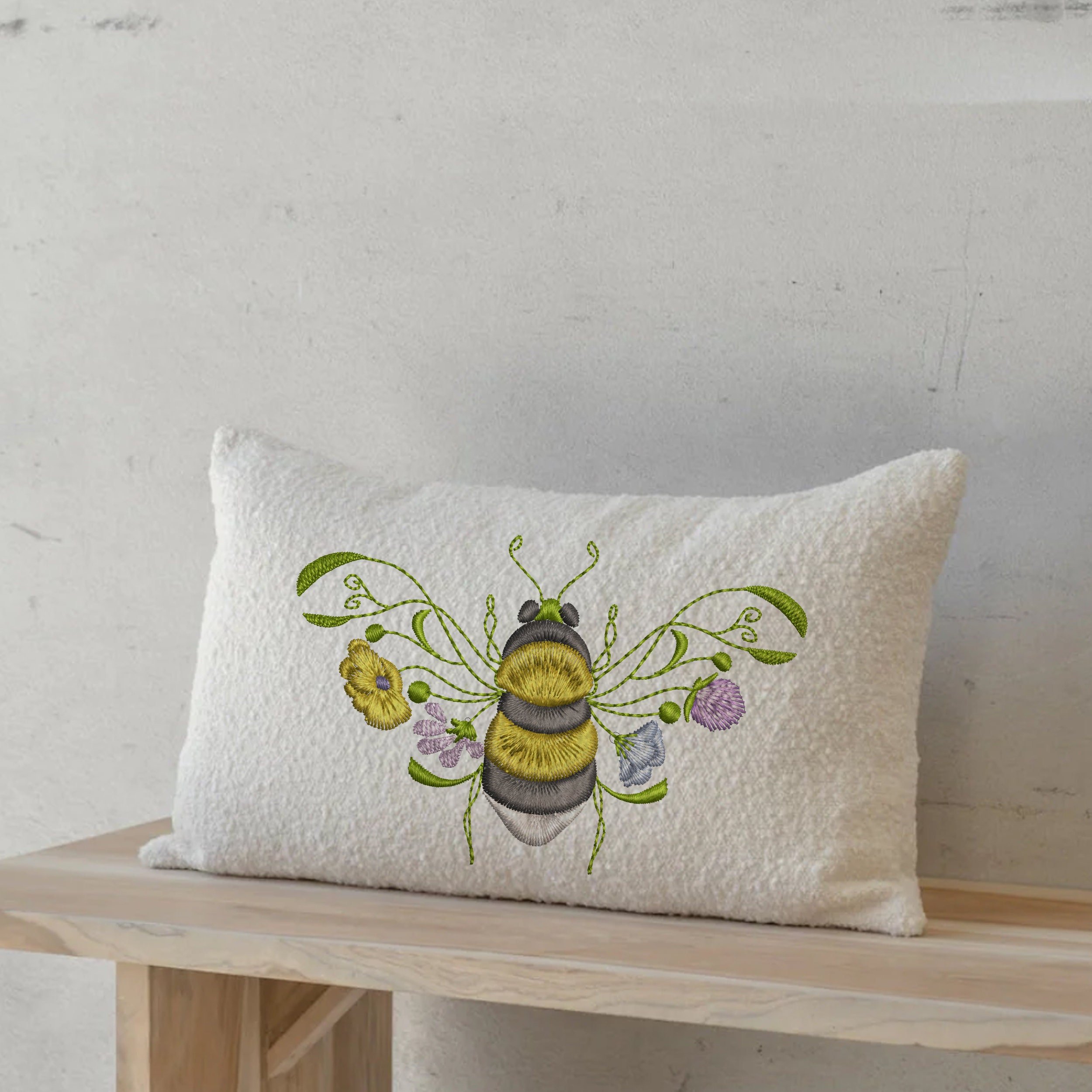 Garden Flower Bee Machine Embroidery Design embroidered on a canvas pillow