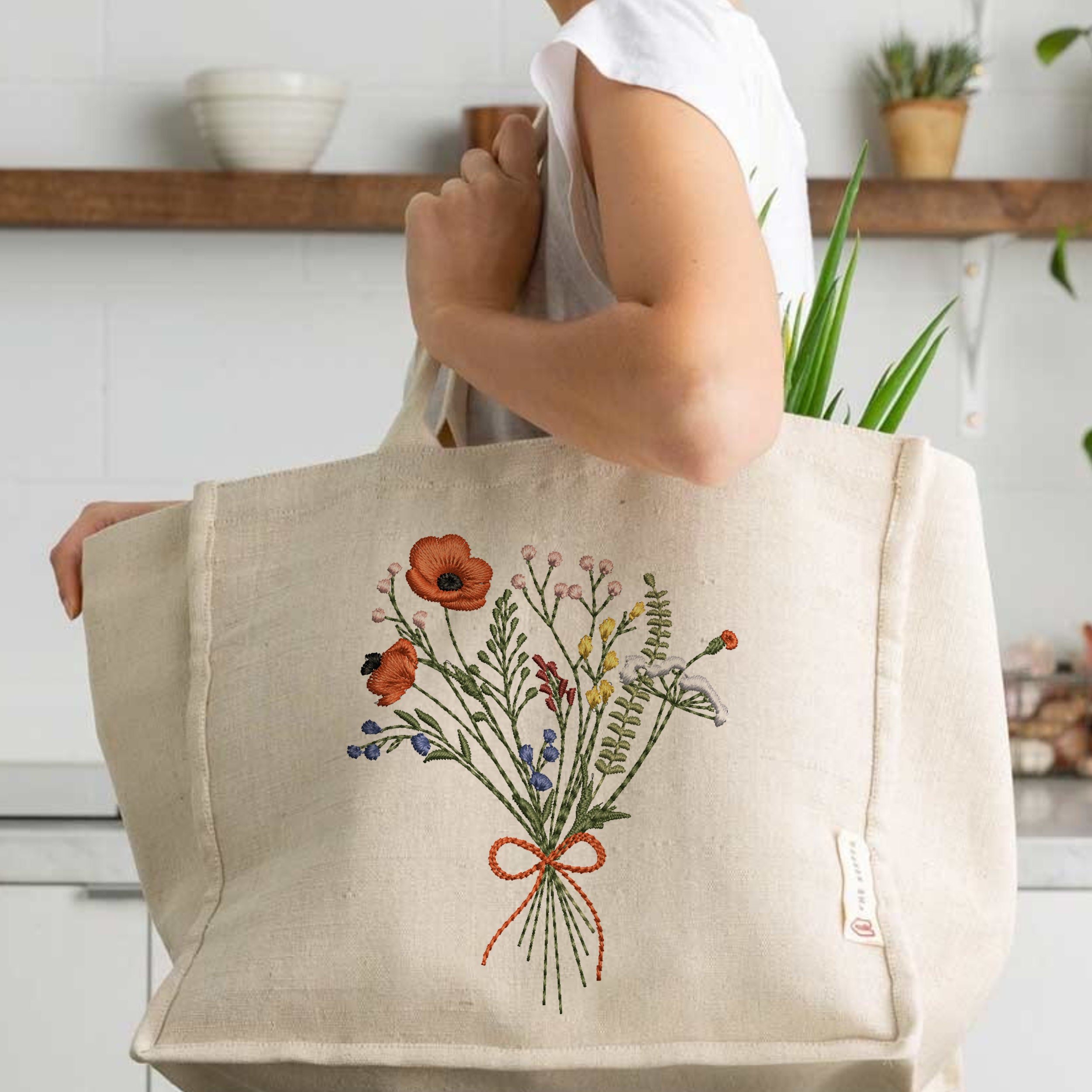 Cowgirl Poppy Wildflower Meadow Bouquet Machine Embroidery Design embroidered on a handbag