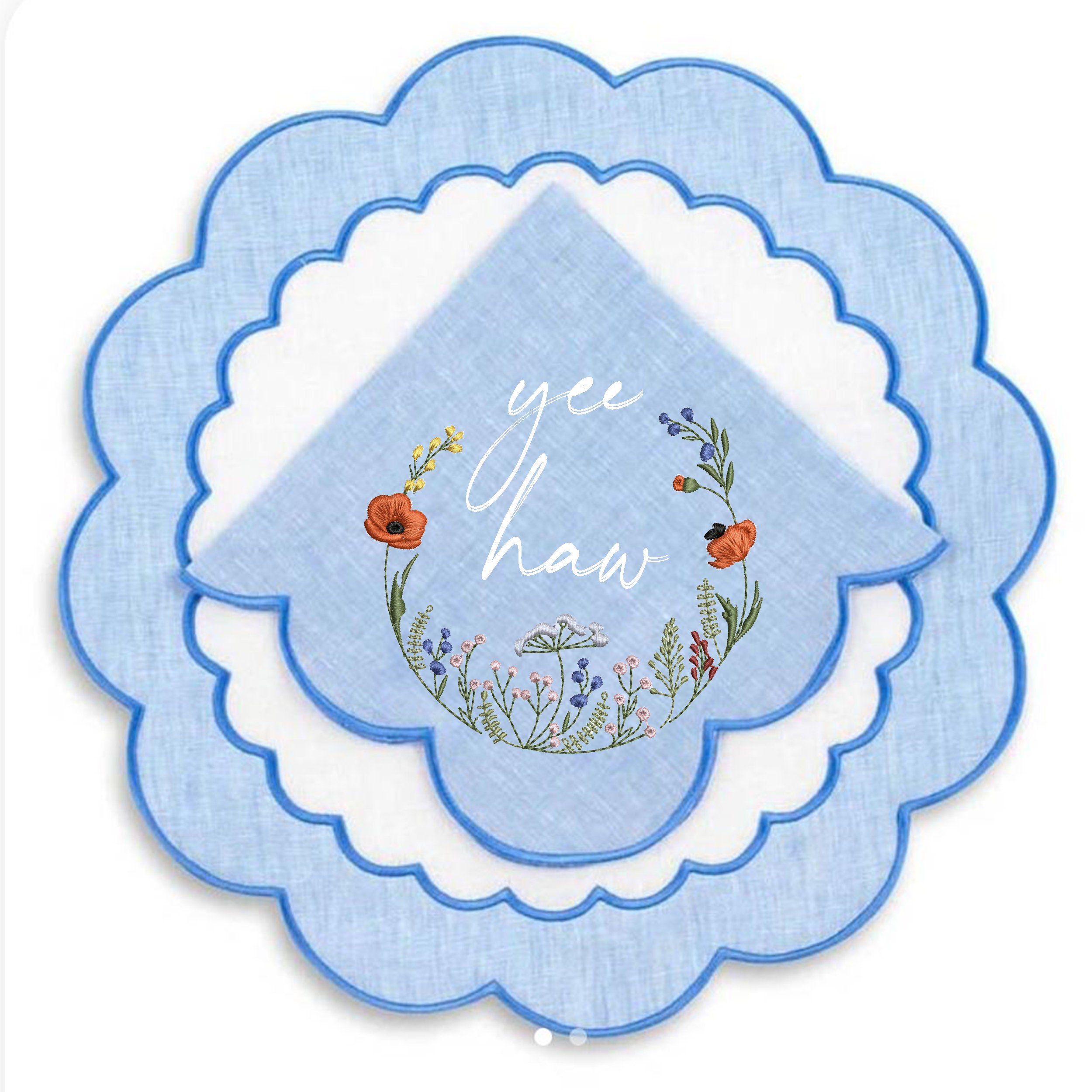 Cowgirl Poppy Wildflower Meadow Wreath and Border Machine Embroidery Design embroidered on a napkin