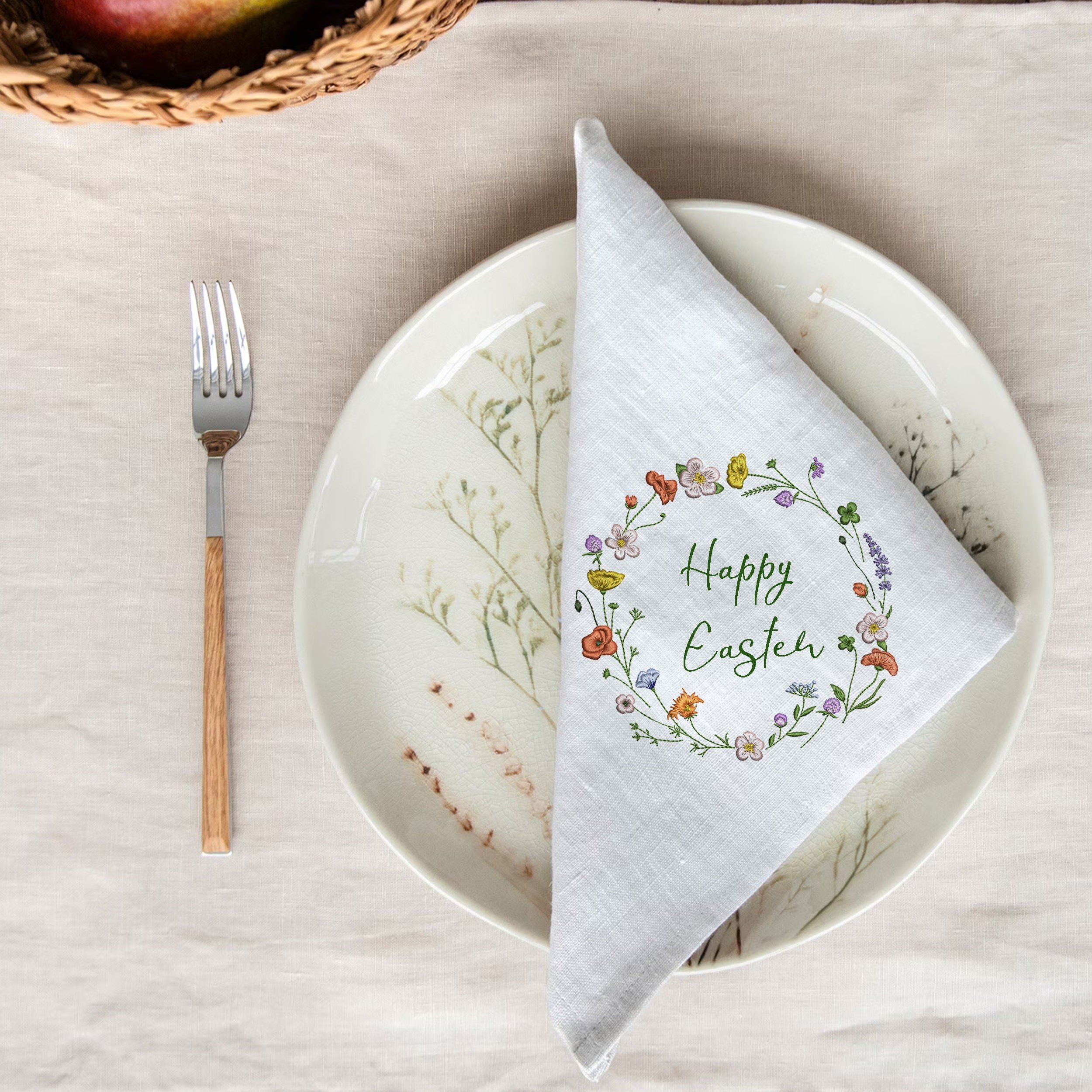 Sparkling Wildflower Wreath and Border Machine Embroidery Design embroidered on a napkin