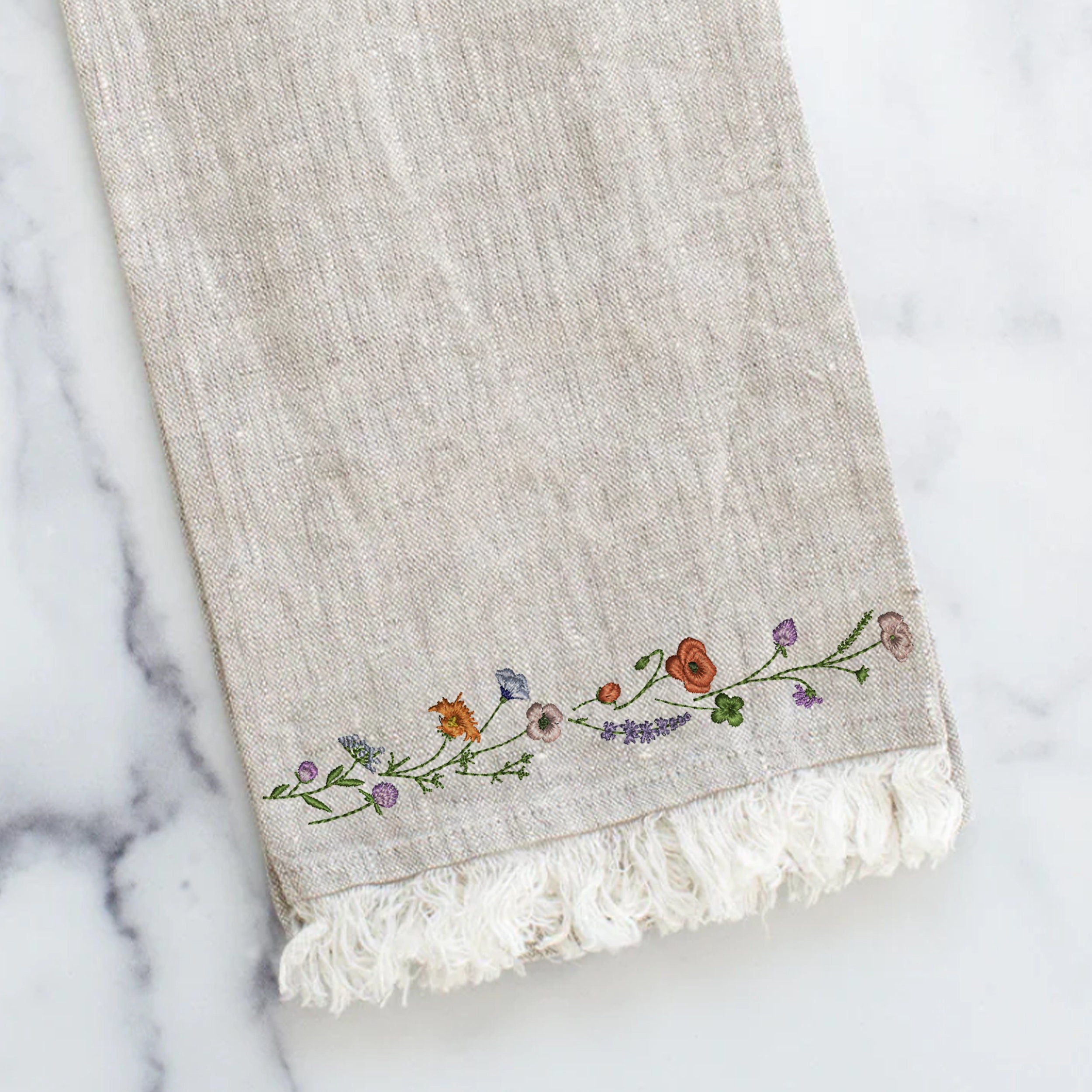 Sparkling Wildflower Wreath and Border Machine Embroidery Design embroidered on a towel