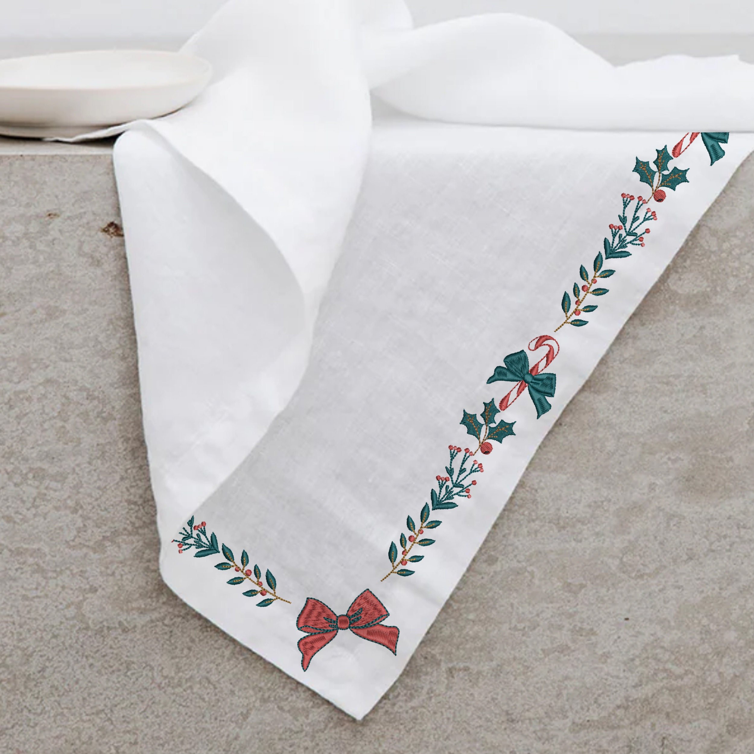 Wonderful Christmas Collection Machine Embroidery Design embroidered on a holiday table cloth